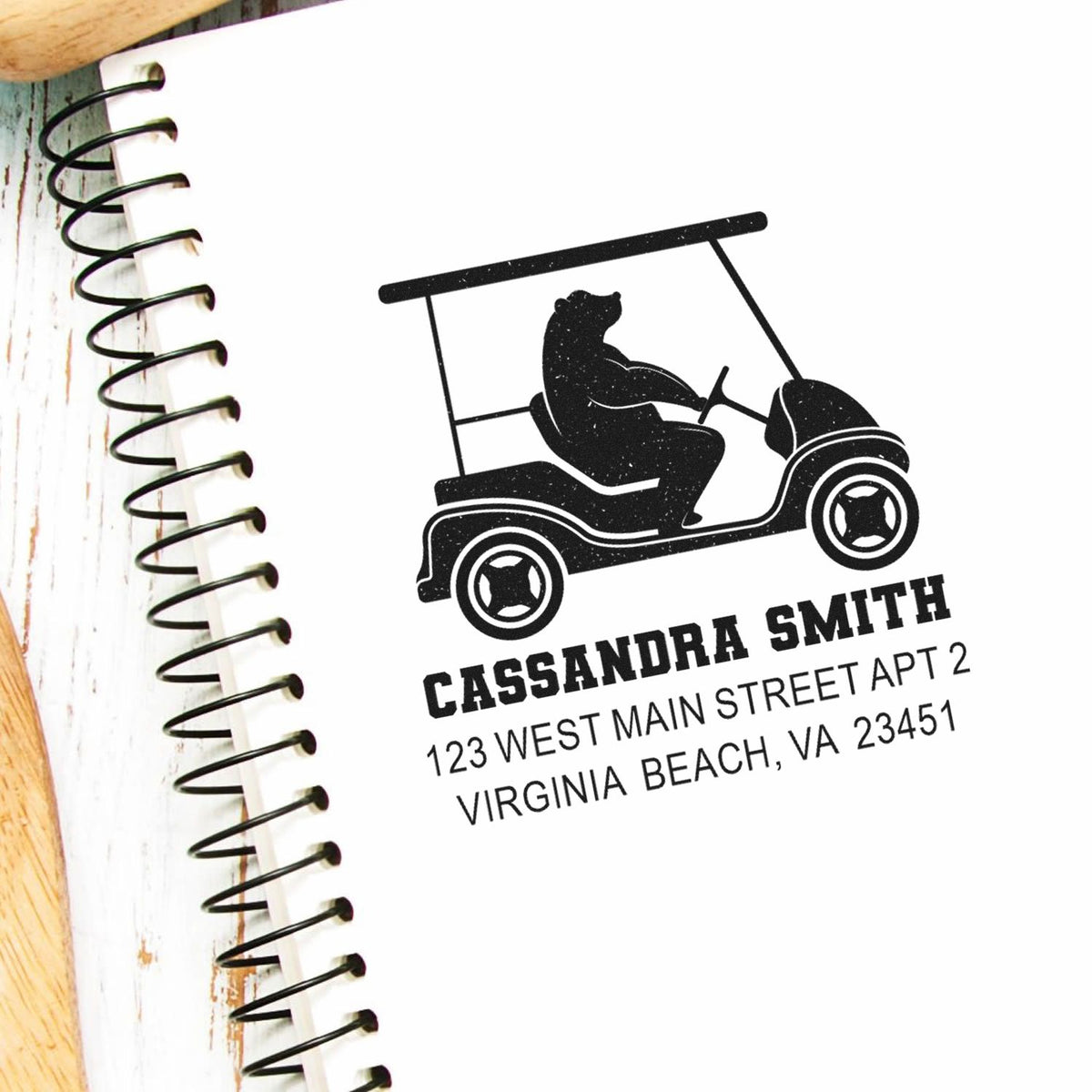 Custom return address rubber stamp with golf cart bear logo, personalized name and address for mailing.