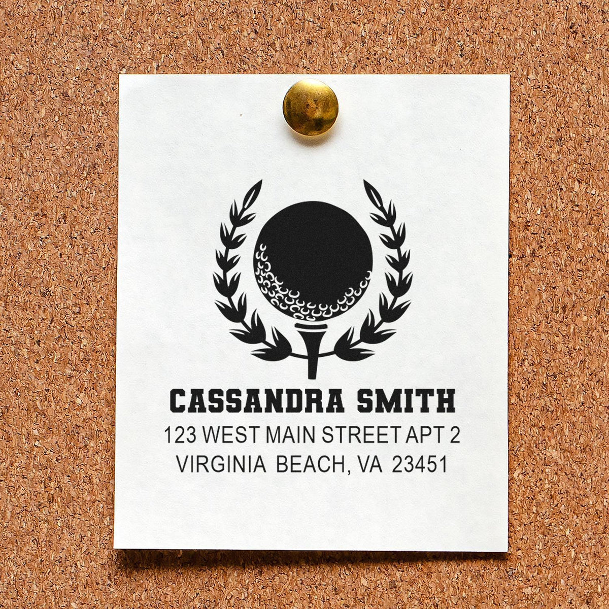 Custom rubber address stamp with golf ball logo, Cassandra Smith name, and Virginia Beach return address on pinned card.