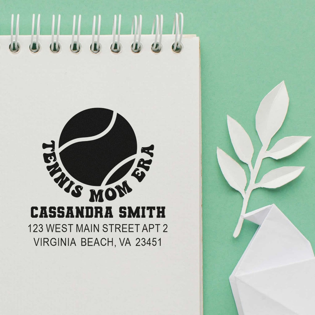 Custom return address rubber stamp for tennis mom Cassandra Smith, Virginia Beach, with tennis ball logo.