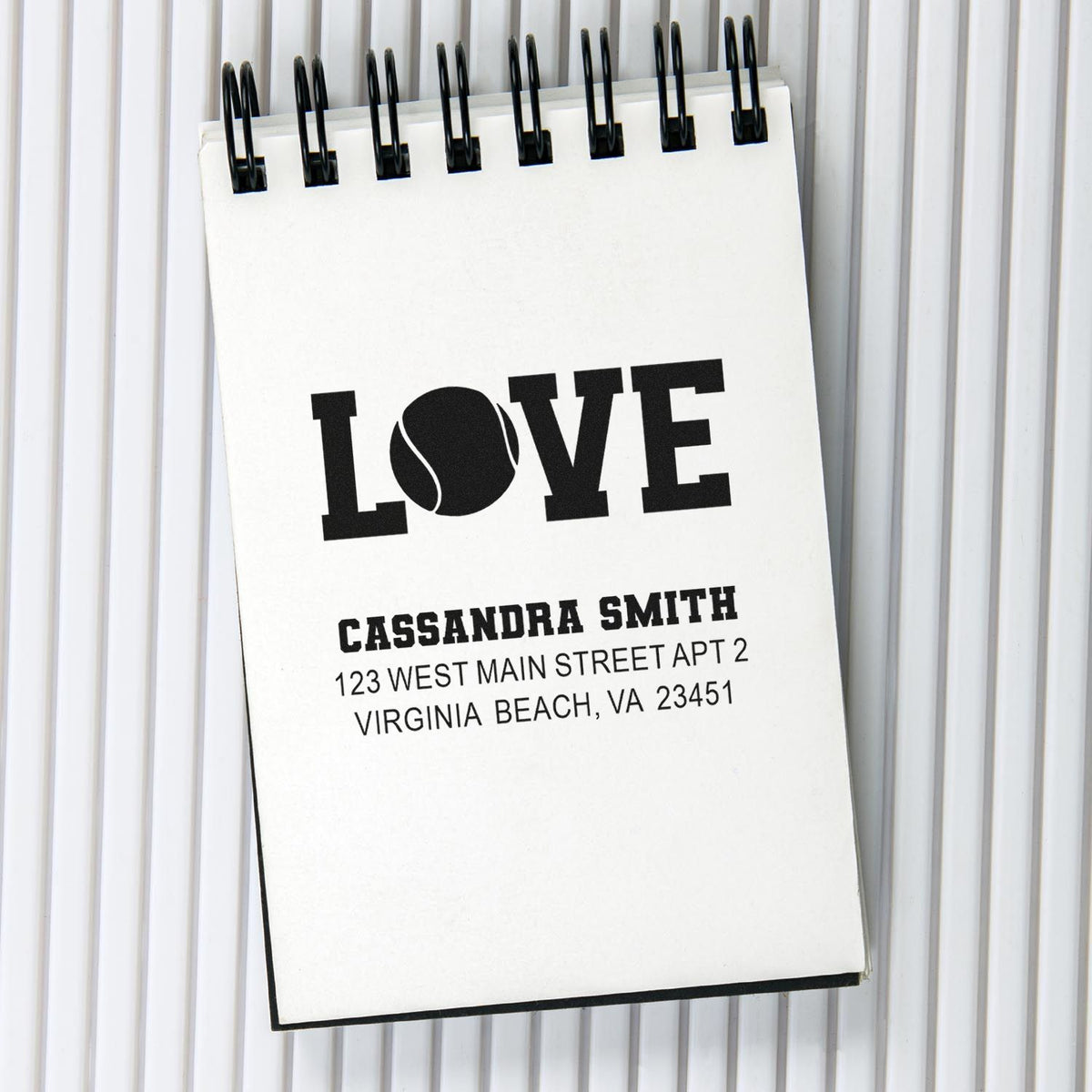 Personalized rubber stamp design with LOVE and return address for Cassandra Smith, ideal for wedding stationery and envelopes.