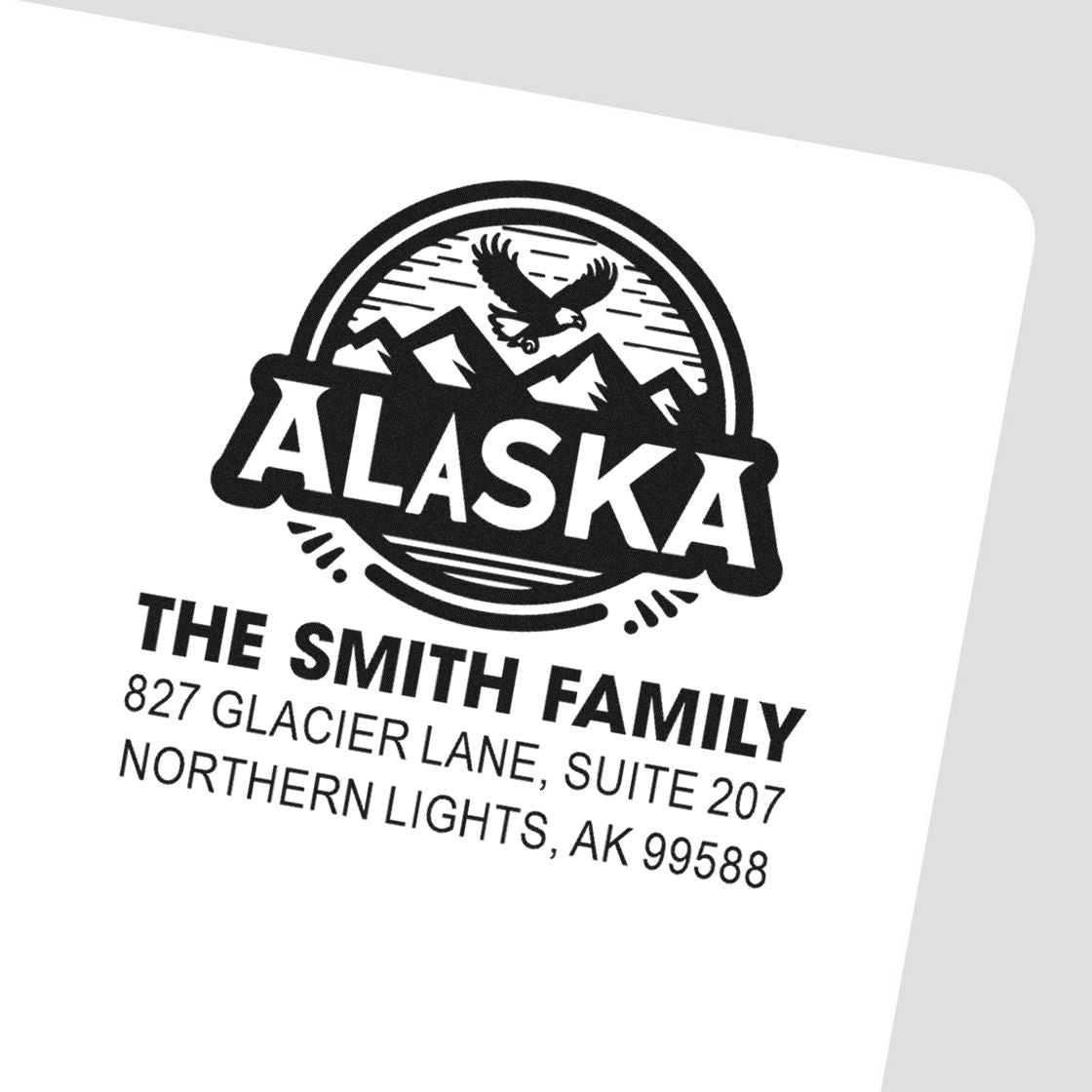 Custom Alaska family return address rubber stamp with eagle and mountains for The Smith Family, Northern Lights, AK 99588.
