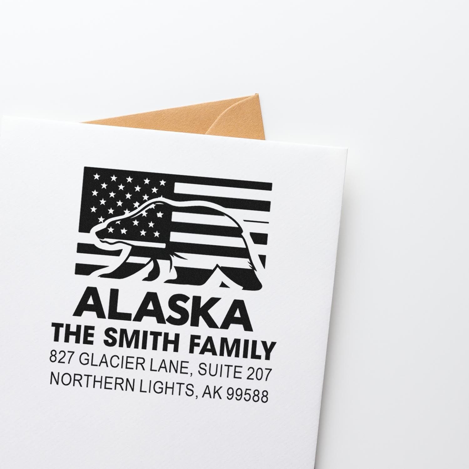 Custom Alaska return address rubber stamp with bear flag design for The Smith Family mail.