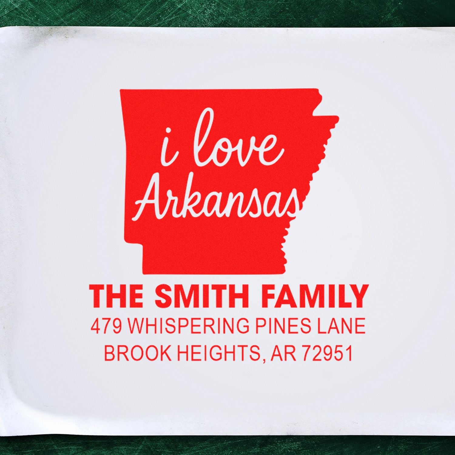 Custom Arkansas return address rubber stamp with I love Arkansas and family name for personalized mailing.