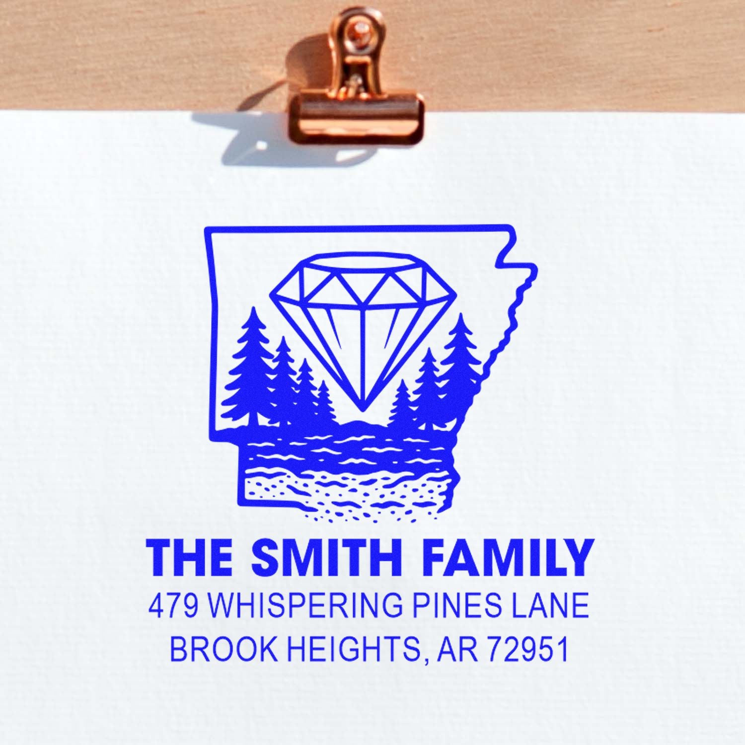 Custom return address rubber stamp with Arkansas state outline, diamond and pine trees for The Smith Family.