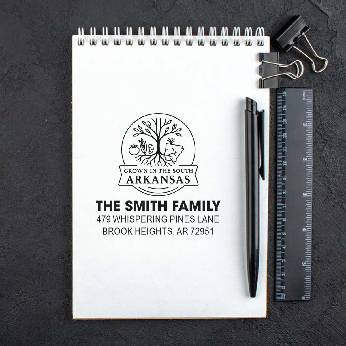Custom return address rubber stamp for The Smith Family, Arkansas, with personalized name and address design.