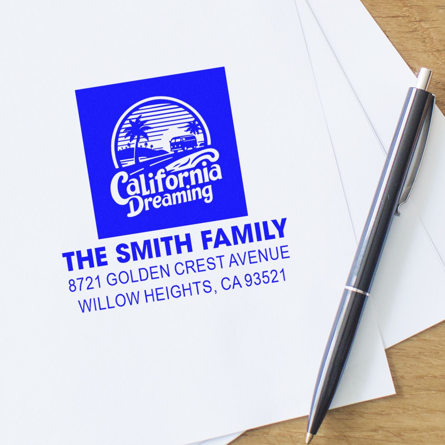 Custom rubber stamp address imprint for The Smith Family with California Dreaming logo on mail envelope.