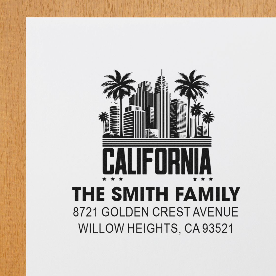 Custom California return address rubber stamp with skyline, palm trees, The Smith Family name, and mailing address.