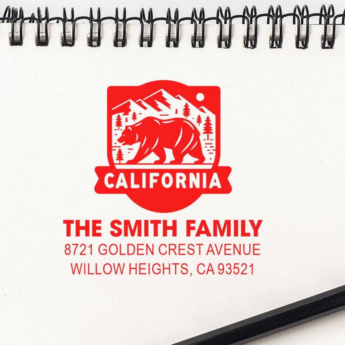 Personalized rubber stamp design for The Smith Family California address, with bear logo for mailings and packaging.