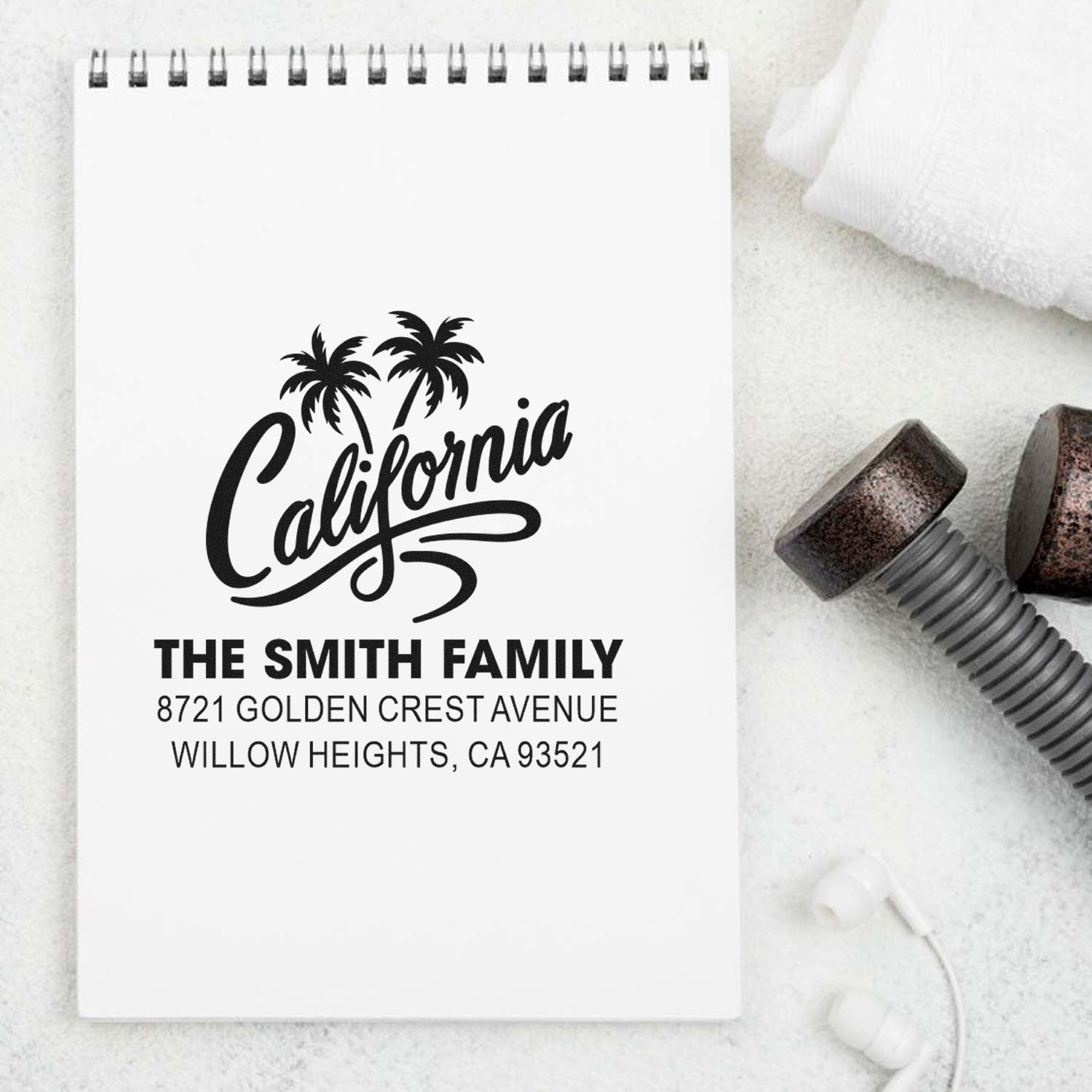 Custom California address rubber stamp for The Smith Family with palm tree design and return mailing address.