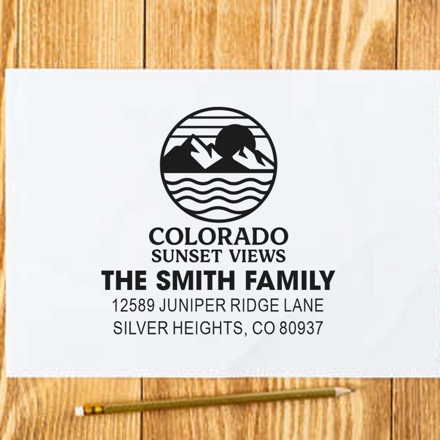 Custom Colorado family return address rubber stamp with mountain sunset logo and Smith family address for envelopes