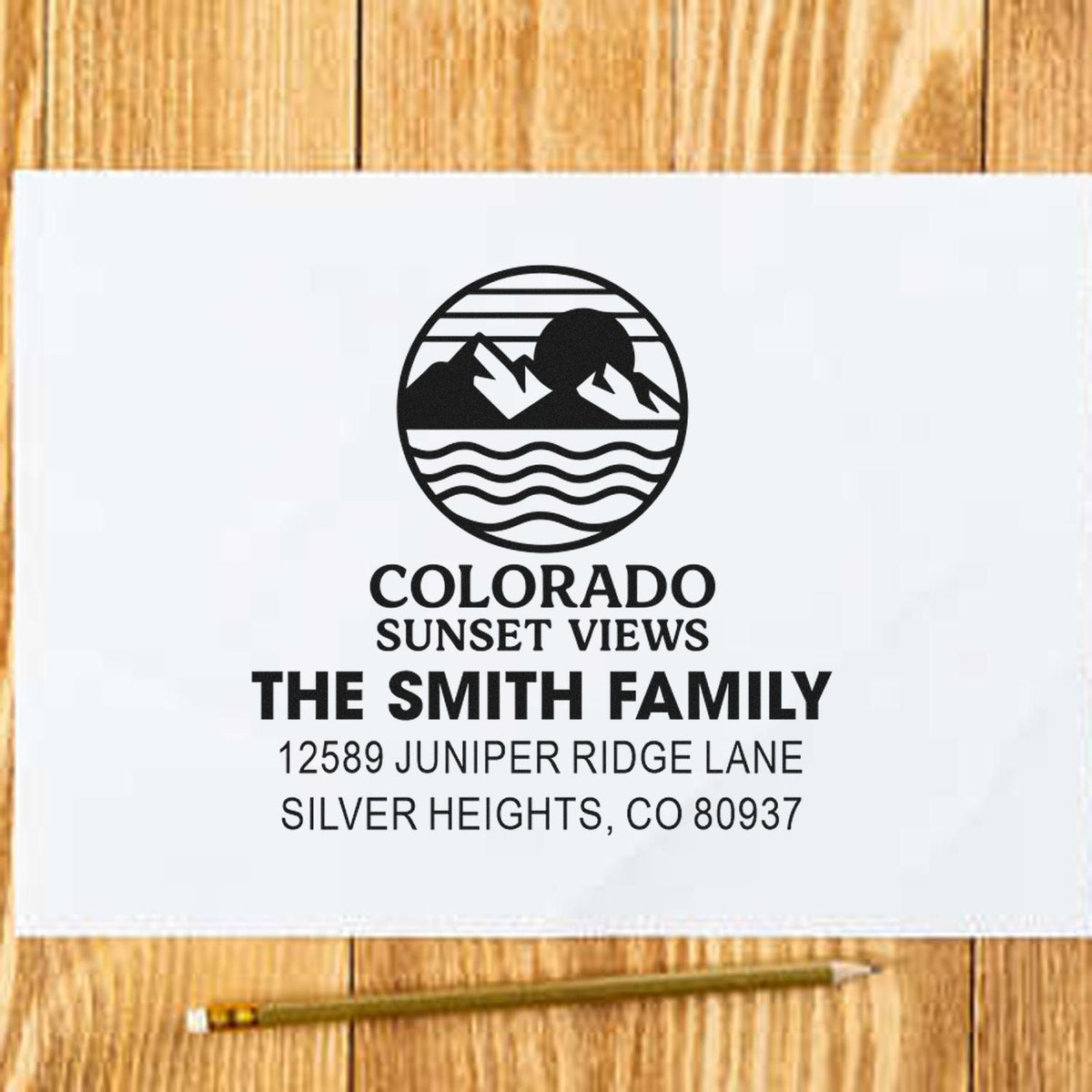 Custom Colorado return address rubber stamp with mountain logo, Colorado Sunset Views, for The Smith Family.