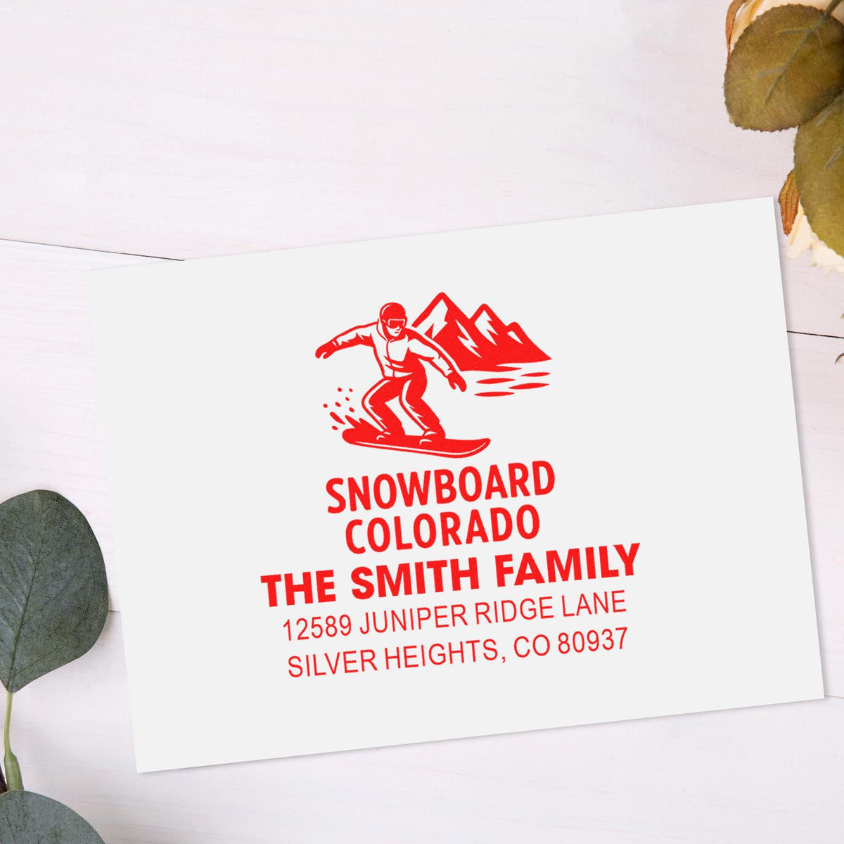 Custom personalized snowboard family address rubber stamp with Colorado snowboarder graphic and Silver Heights, CO mailing details.