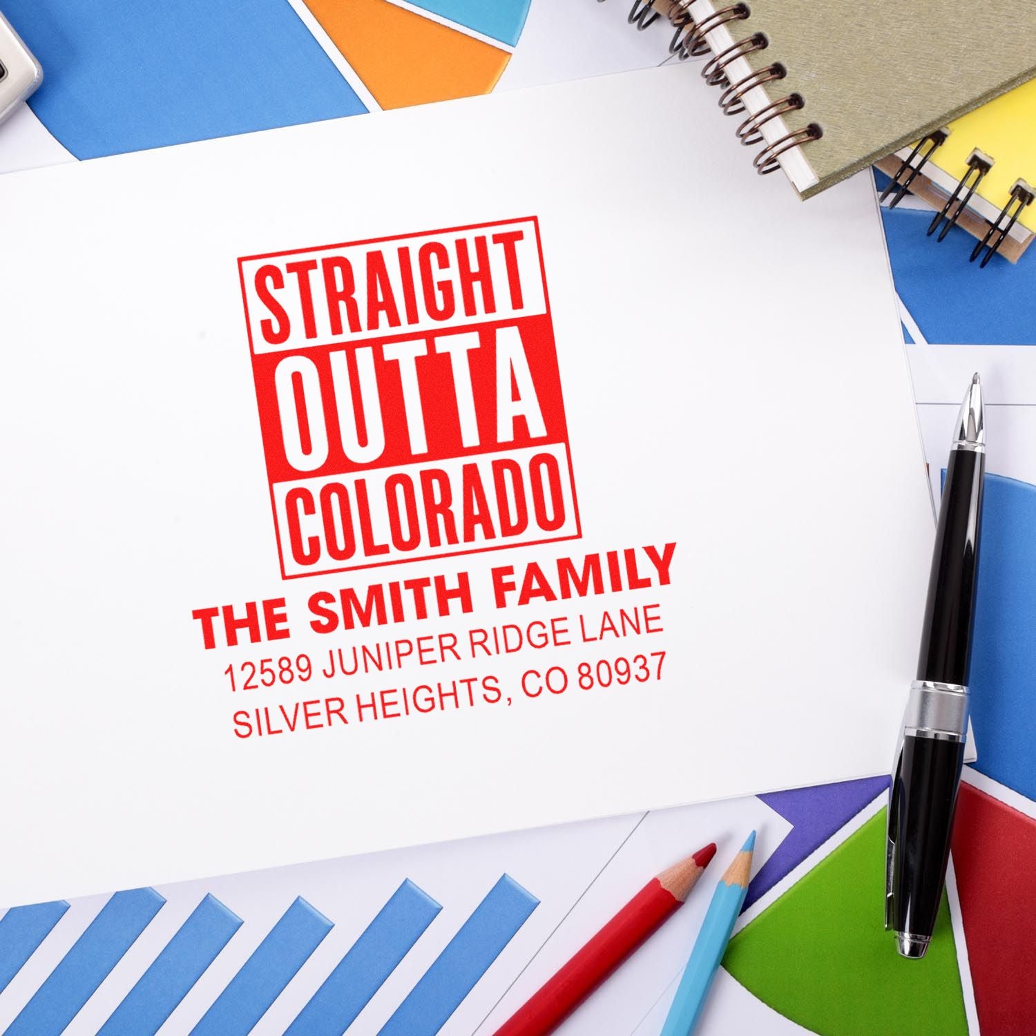 Custom rubber stamp with Straight Outta Colorado design and Smith family return address imprint on paper.