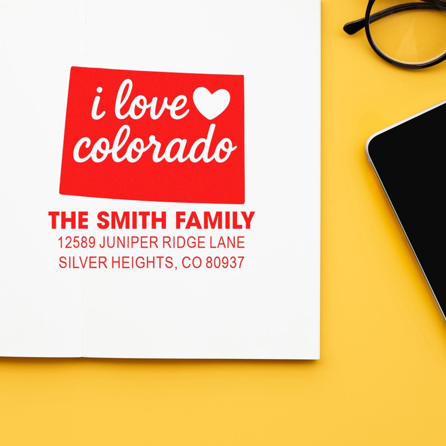 Custom rubber stamp with I love Colorado return address for The Smith Family in Silver Heights, CO 80937.