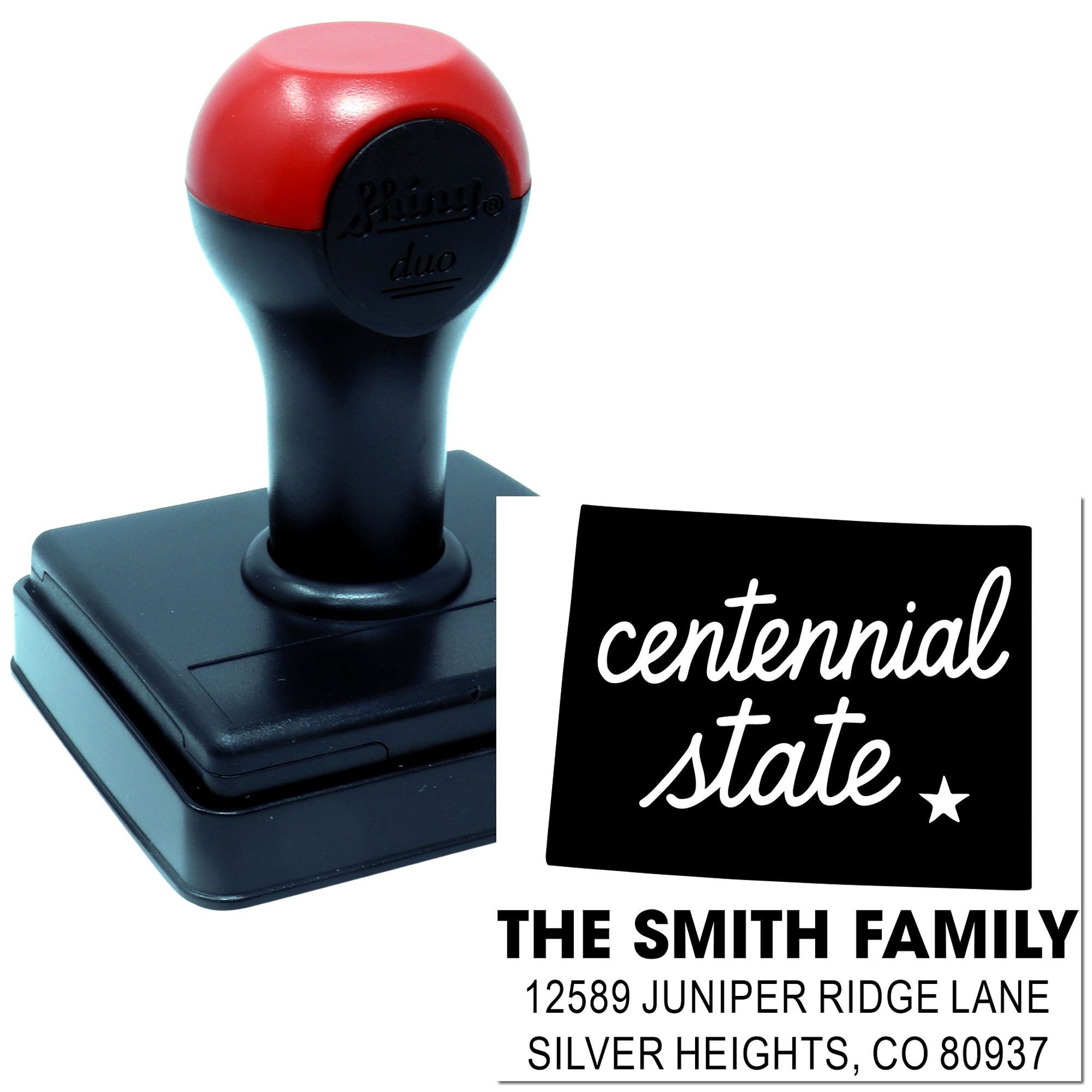 Custom self-inking rubber stamp for The Smith Family address with Centennial State design.