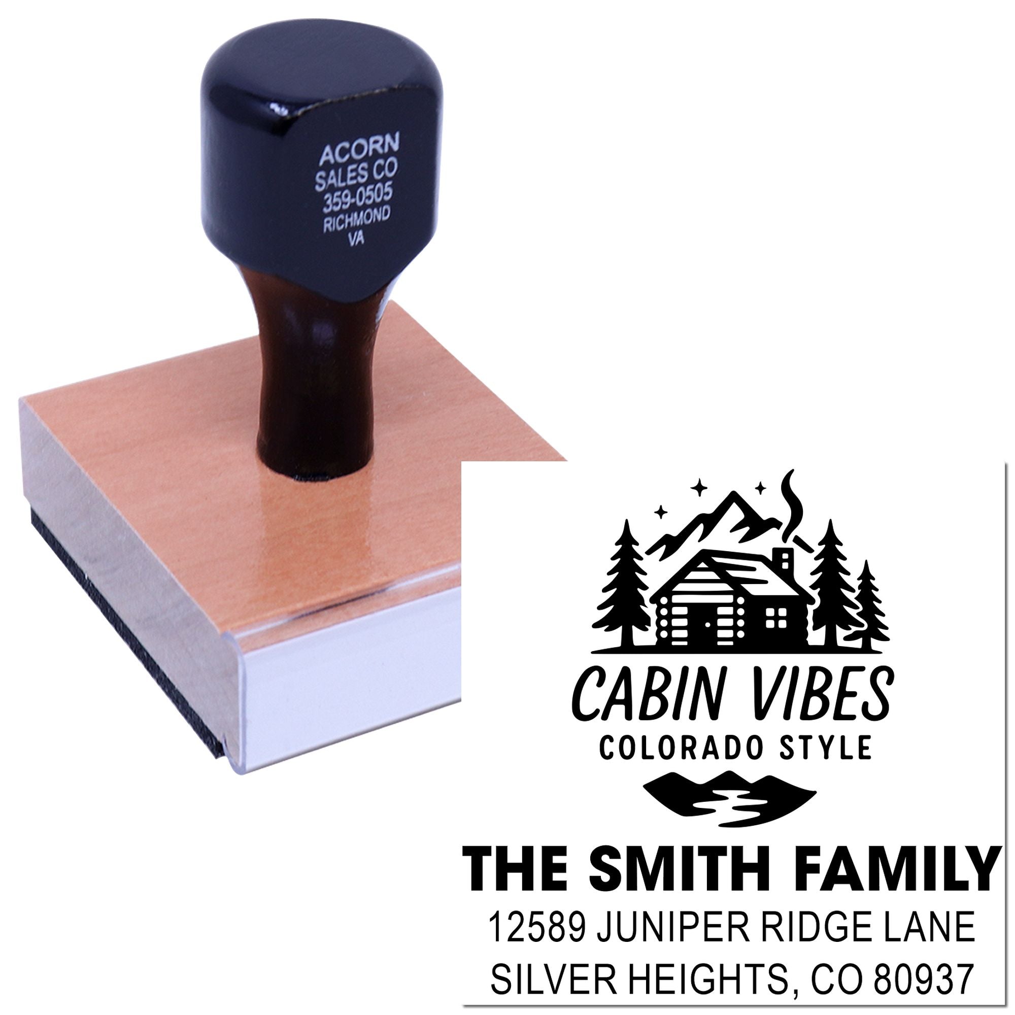 Custom rubber address stamp with log cabin design, family name, and Colorado address.