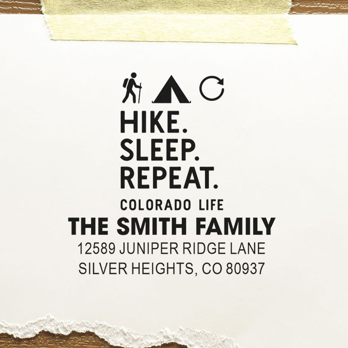 Custom rubber stamp with hiking icon and Hike. Sleep. Repeat. for The Smith Family Colorado return address stamp.