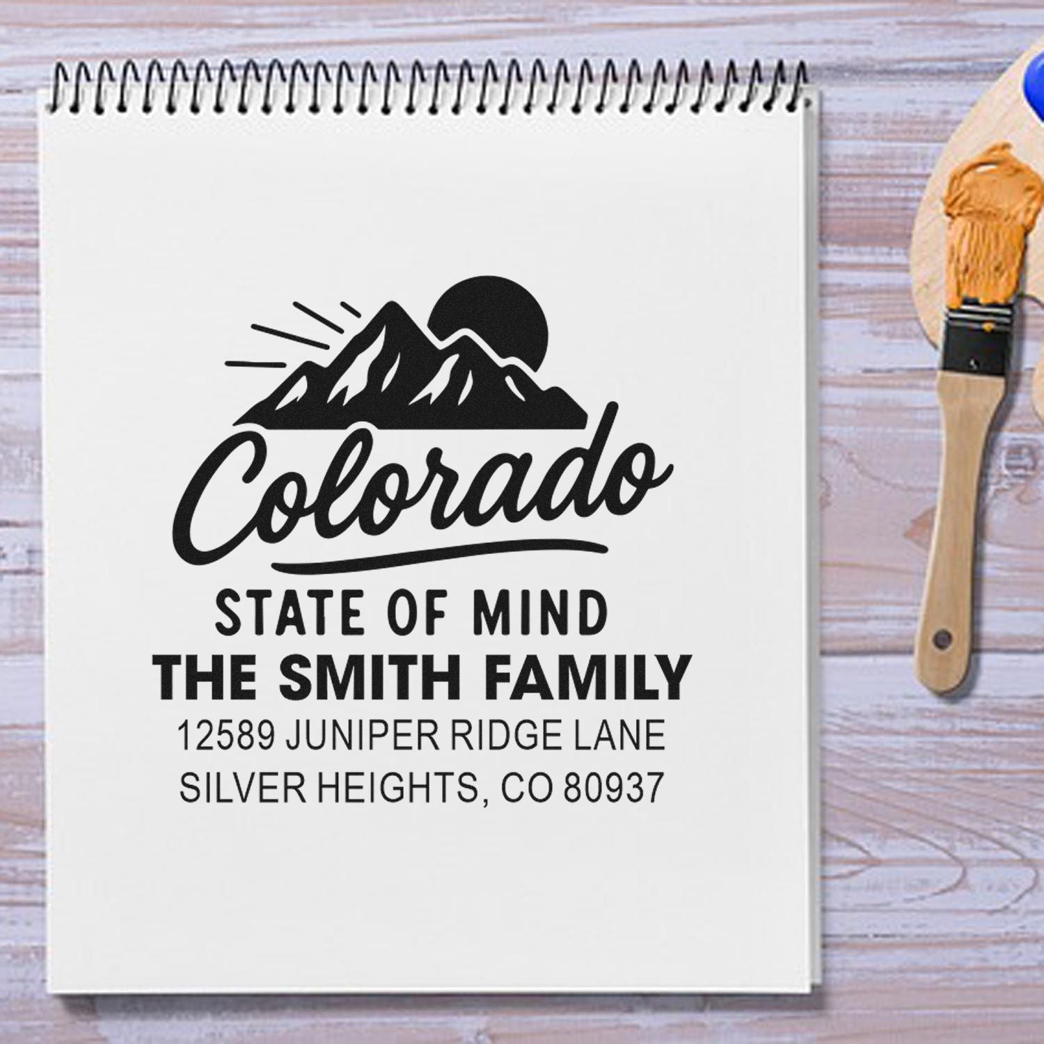 Custom Colorado return address rubber stamp for The Smith Family, with mountain logo and full mailing address.
