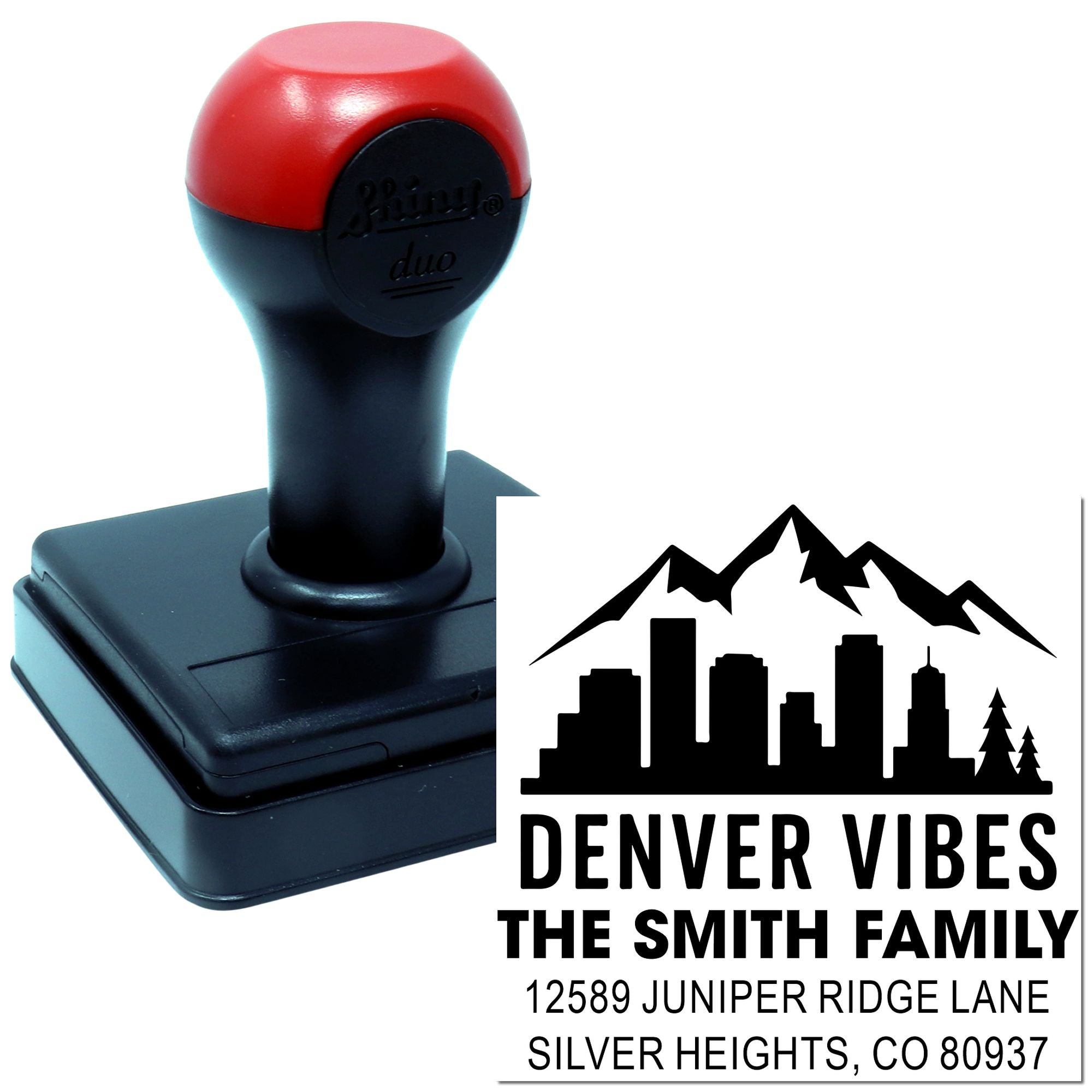 Custom self-inking rubber stamp with Denver skyline family address imprint for personalized mailing and branding.