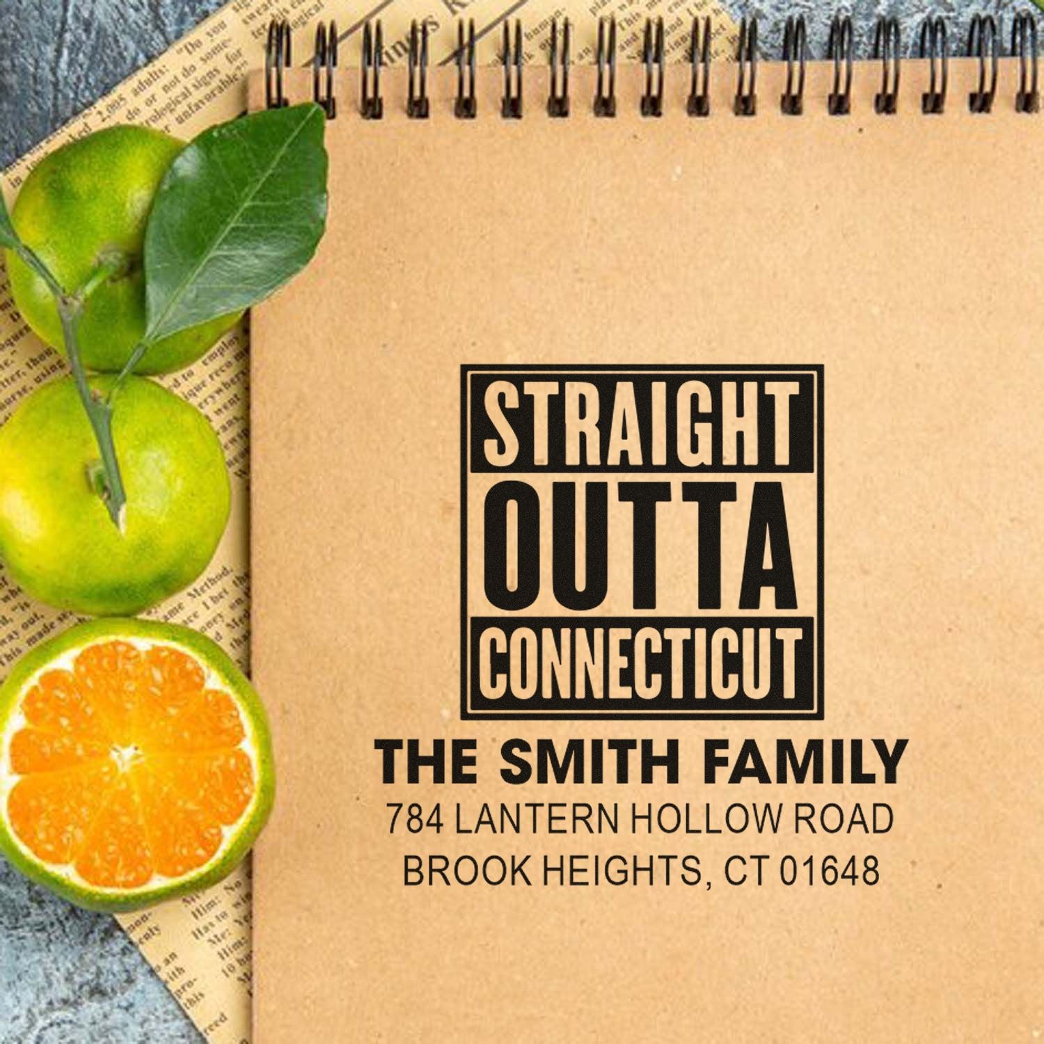 Custom rubber stamp mockup with Straight Outta Connecticut family return address and Brook Heights, CT address.