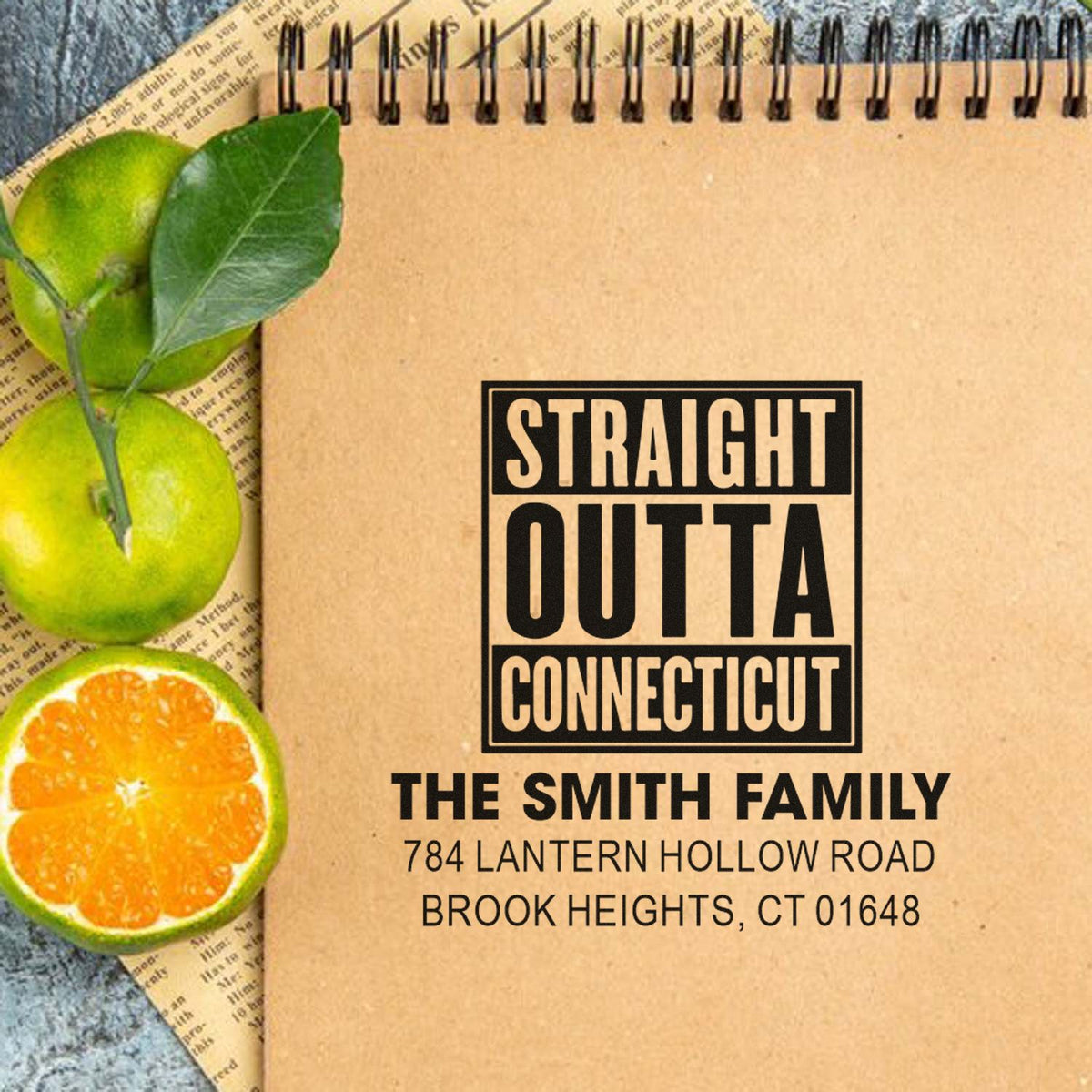 Custom rubber stamp mockup reading Straight Outta Connecticut for The Smith Family address stamp.