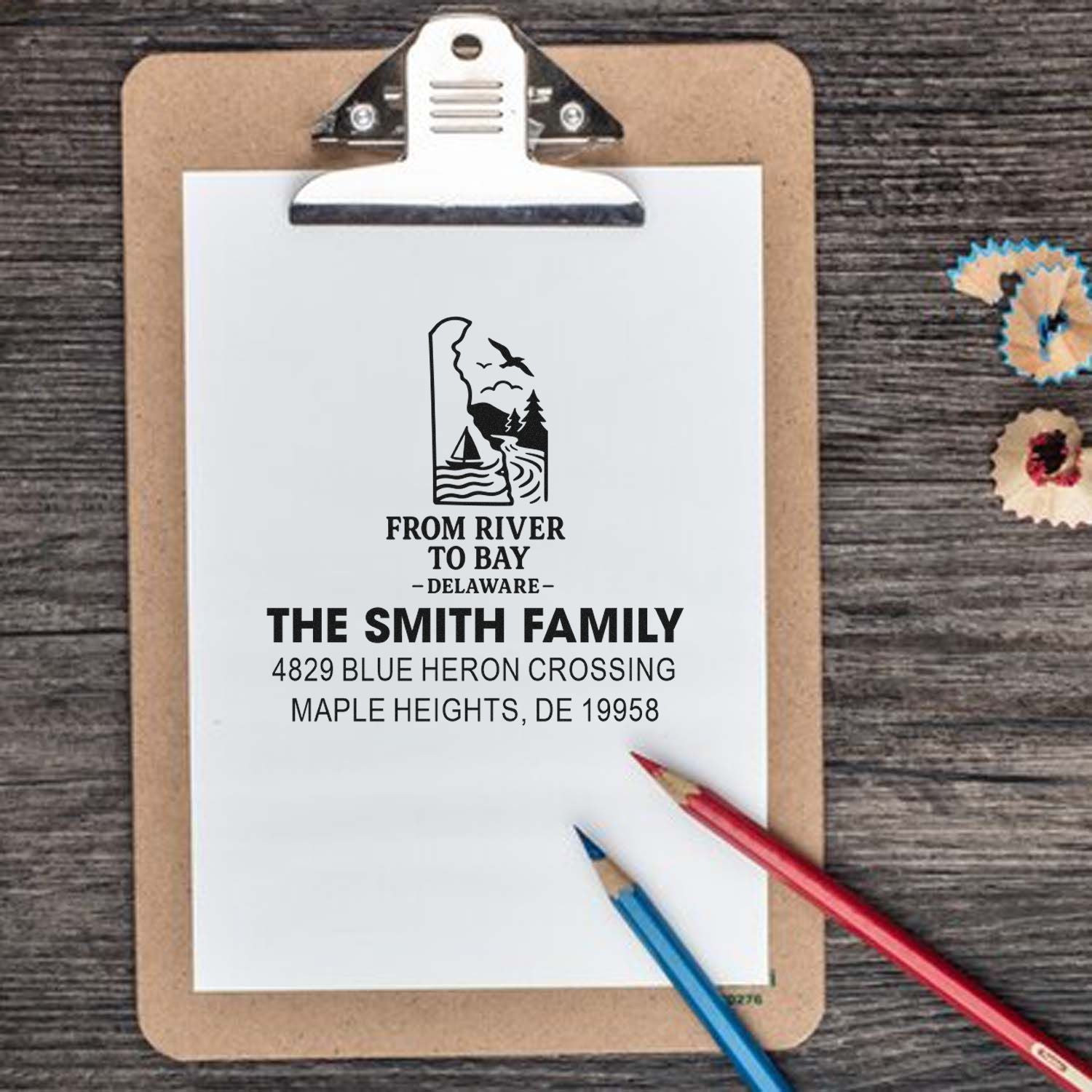 Custom family address rubber stamp with Delaware river-to-bay design for personalized stationery and mailing.