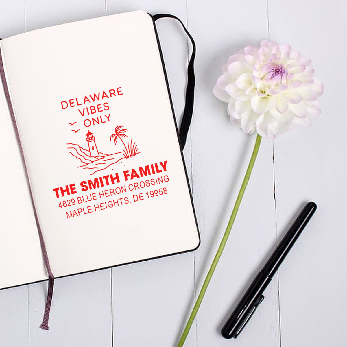 Custom Delaware family address rubber stamp with lighthouse design for personalized stationery and business branding.