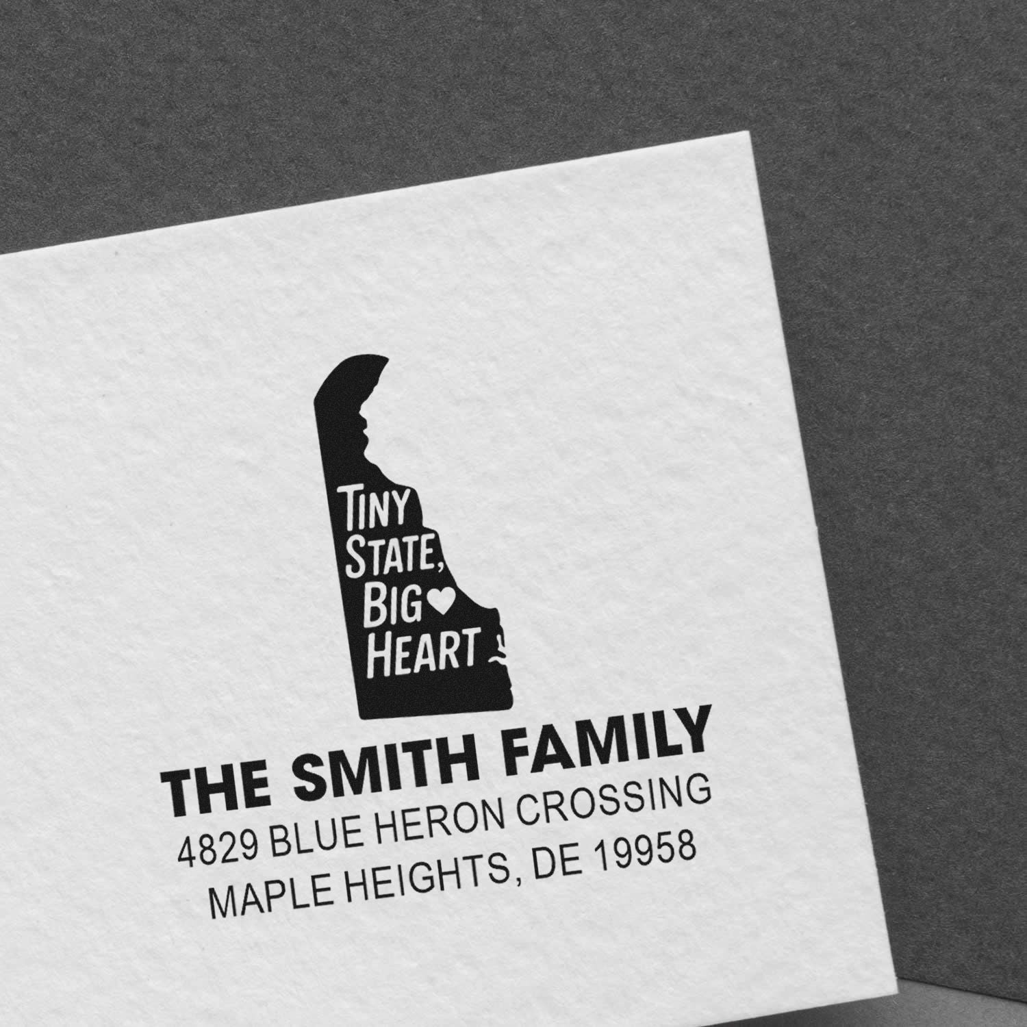 Custom return address rubber stamp with Delaware state design and Tiny State, Big Heart for The Smith Family.