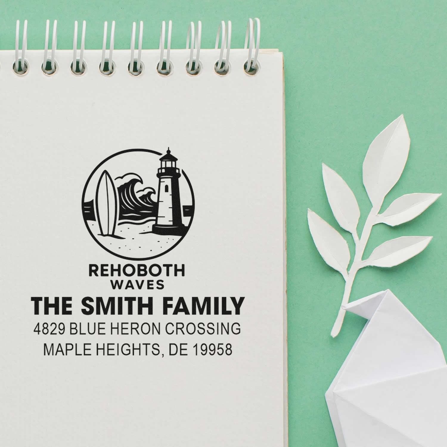 Custom family return address rubber stamp with Rehoboth Waves lighthouse logo for The Smith Family, Maple Heights, DE.