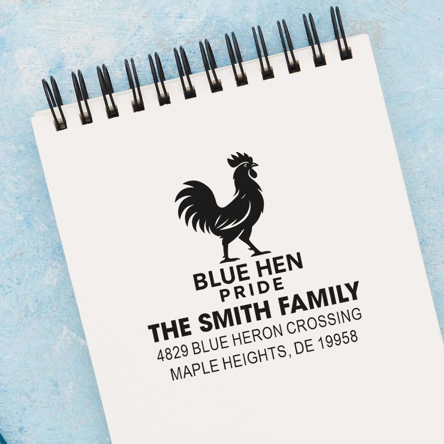 Custom family address rubber stamp with rooster logo and Blue Hen Pride design.