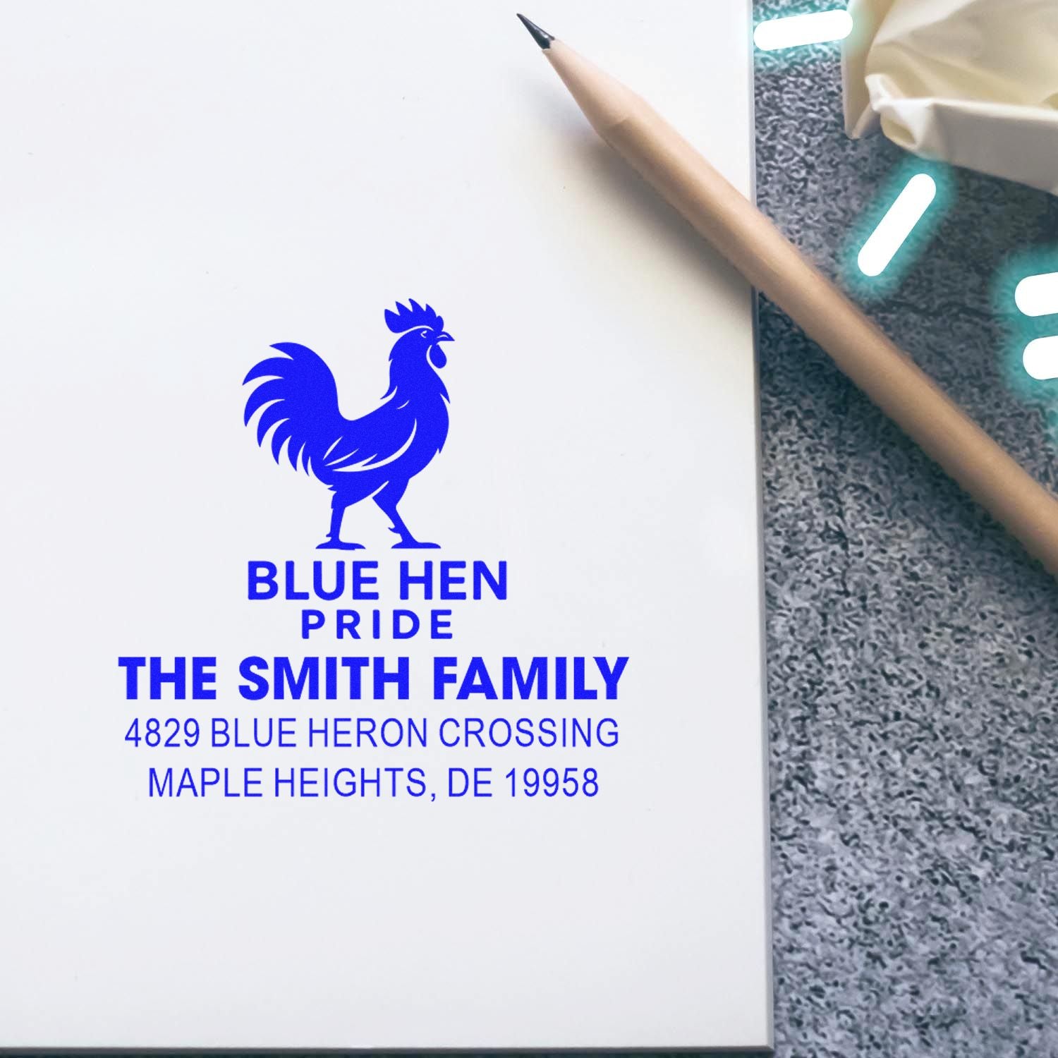 Custom address rubber stamp for The Smith Family, featuring a blue rooster logo and Maple Heights, DE return address.