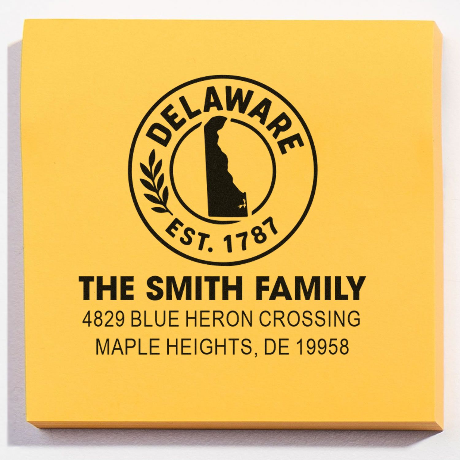 Custom Delaware return address rubber stamp for The Smith Family with state seal logo and Maple Heights address.