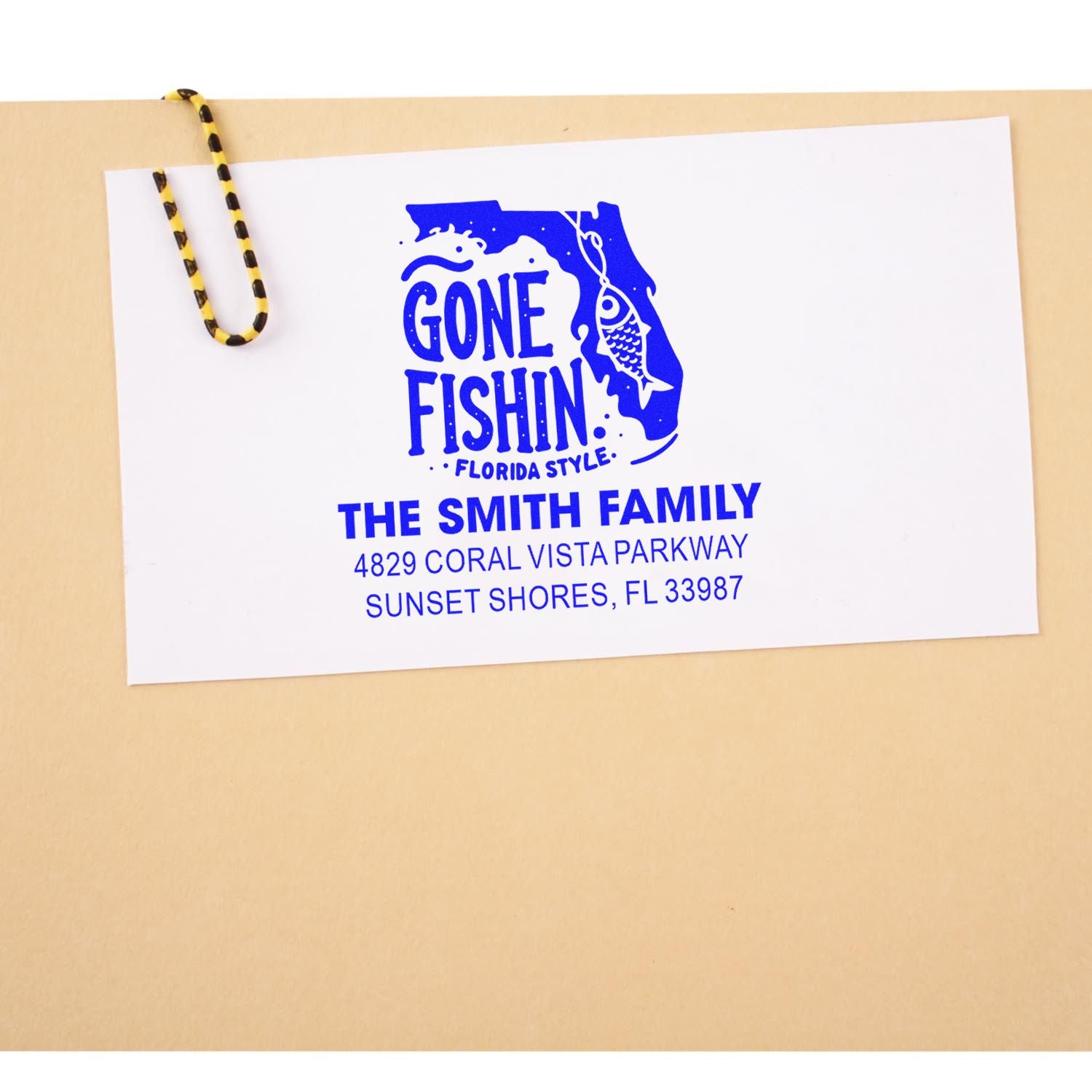 Custom rubber stamp design with Gone Fishin Florida Style logo and The Smith Family address for mailing cards.