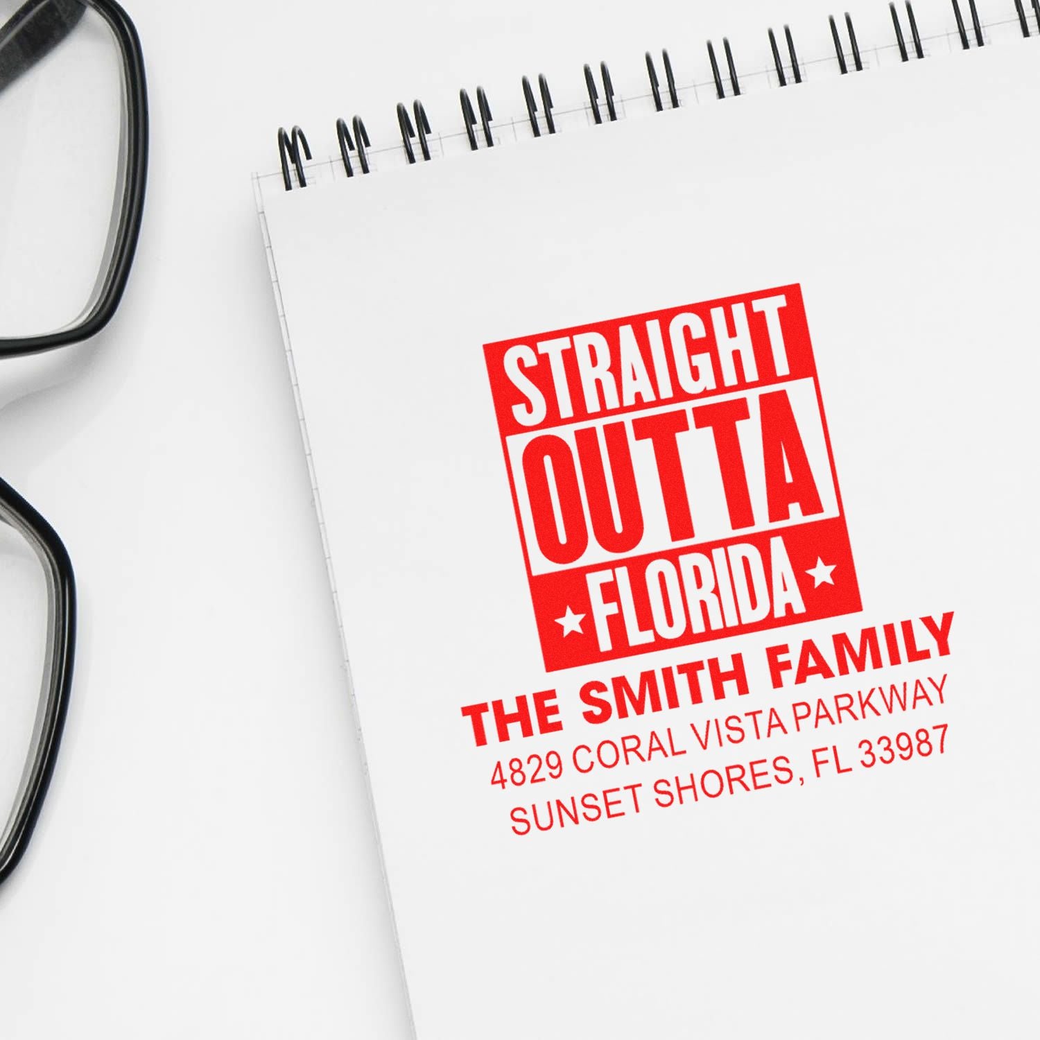 Custom address rubber stamp with Straight Outta Florida design, family name, and mailing address.