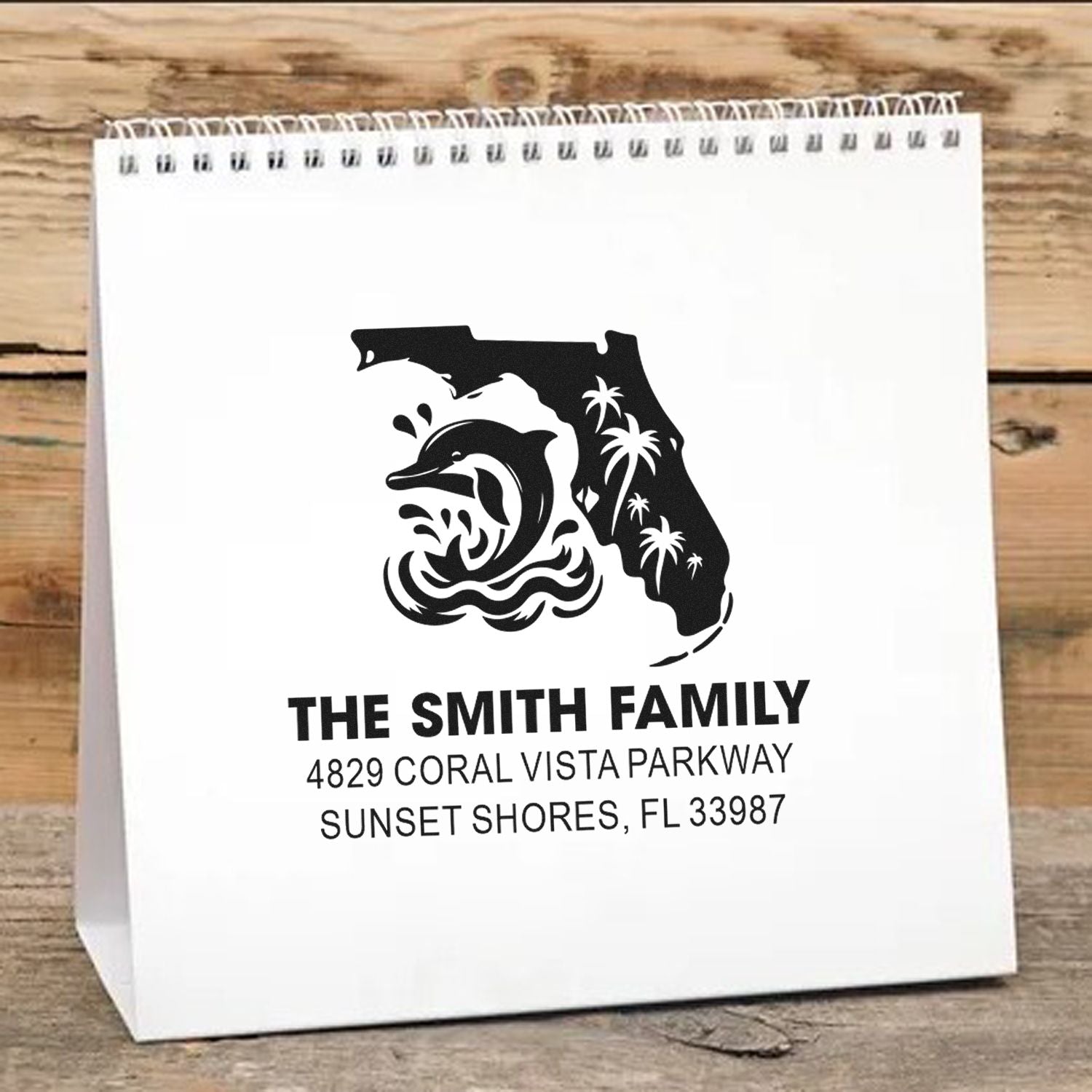 Personalized Florida family rubber stamp with dolphin and palm tree design for custom name and address paper bags.