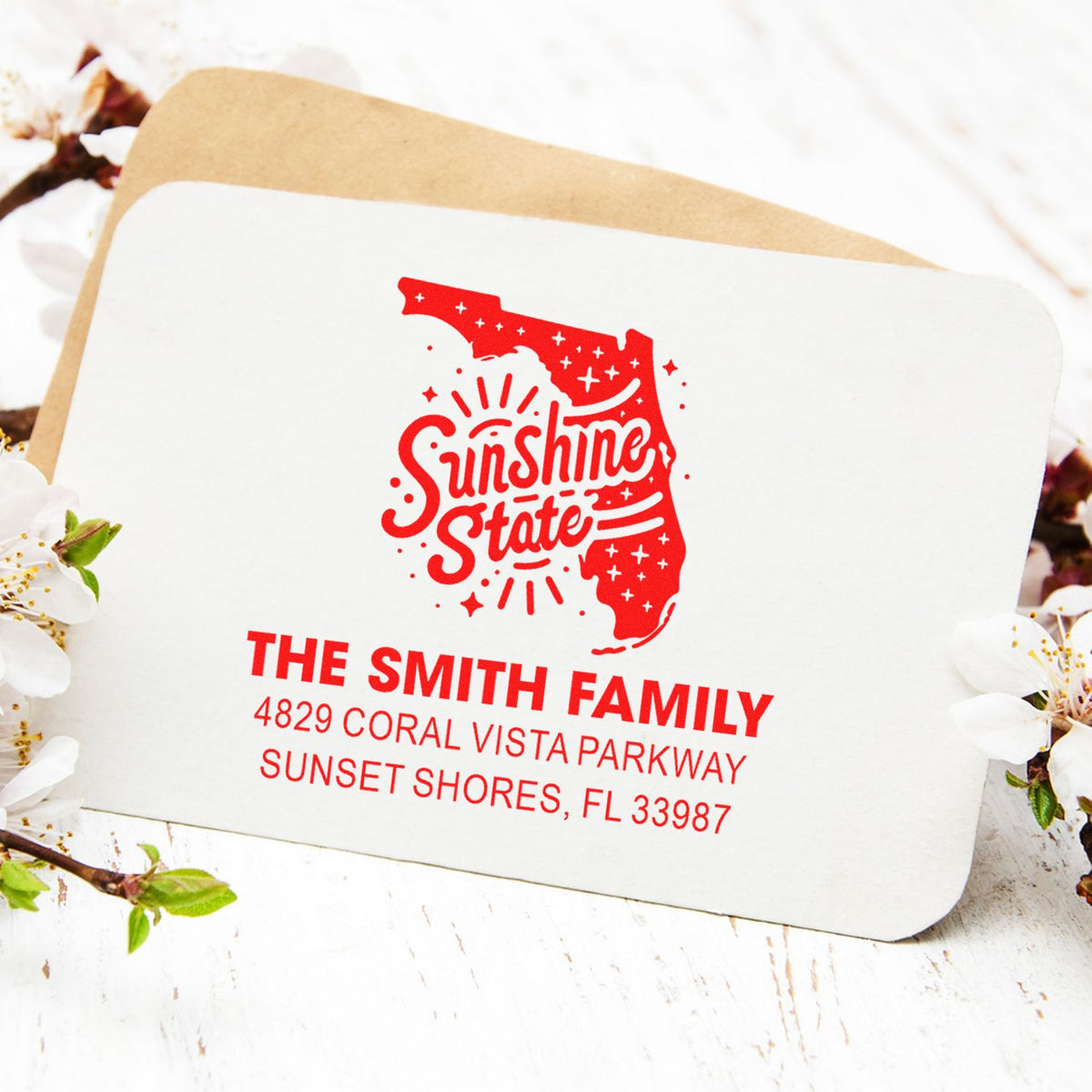 Custom return address rubber stamp with Florida Sunshine State design for The Smith Family envelope, Sunset Shores, FL