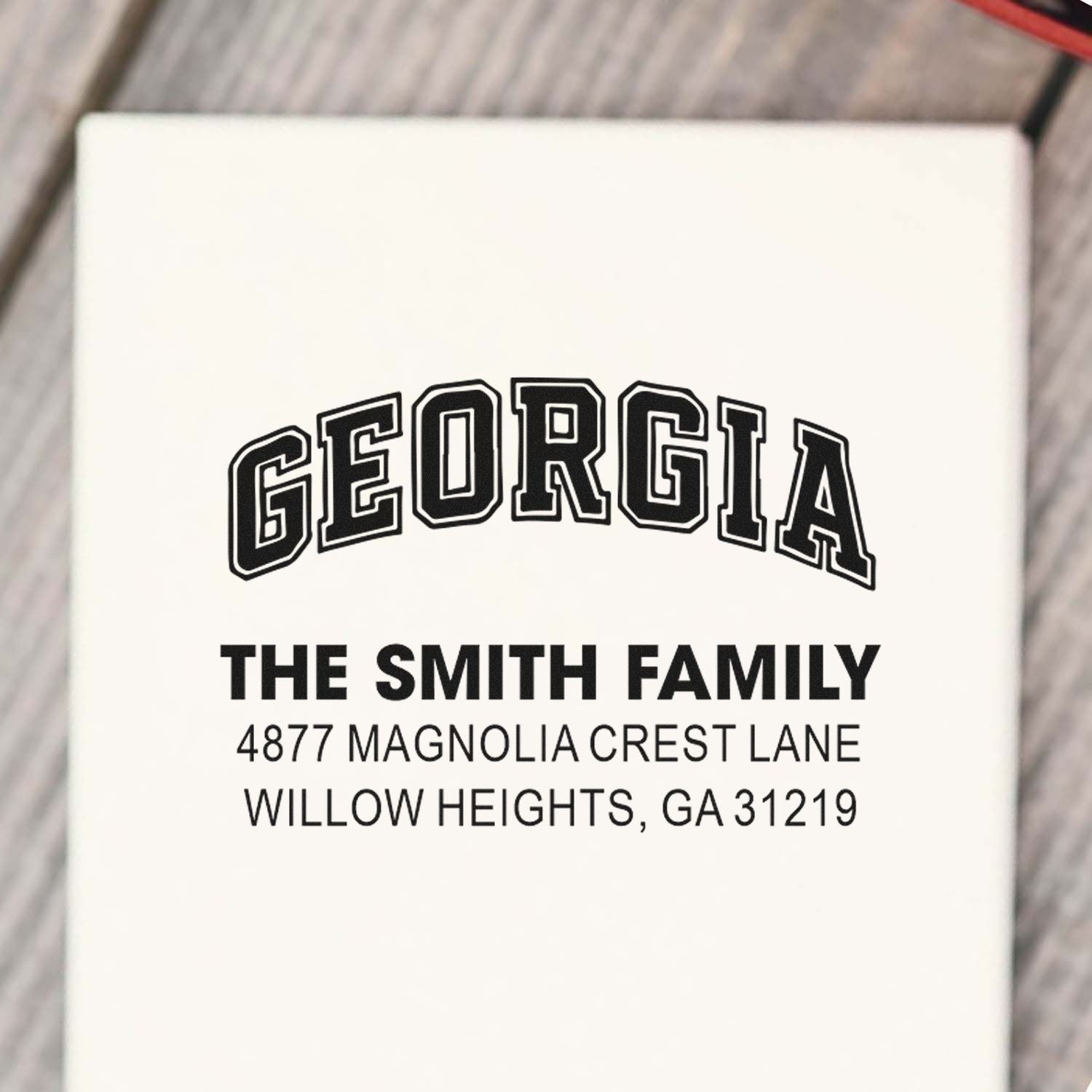 Custom address rubber stamp for The Smith Family in Georgia, with name, street address, and Willow Heights, GA 31219.