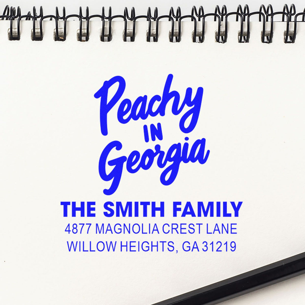 Custom rubber stamp preview for The Smith Family, featuring Peachy in Georgia and a personalized Georgia return address.