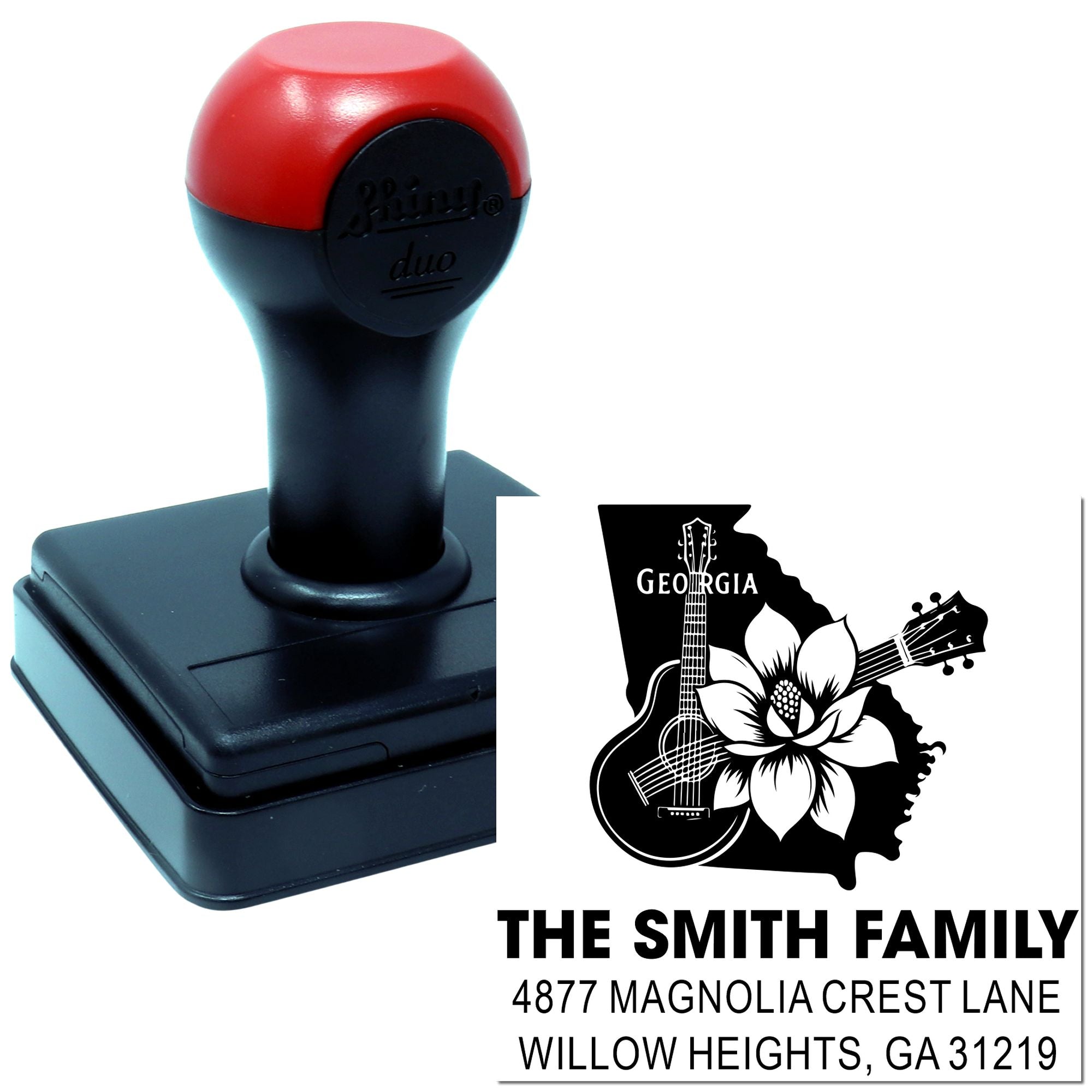 Custom self-inking rubber stamp with Georgia family address and personalized logo design for envelopes and mailings.