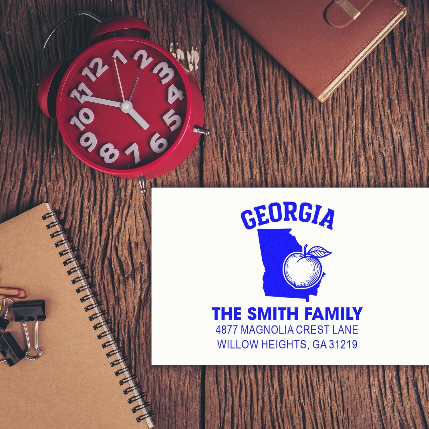 Custom return address rubber stamp with Georgia state design, The Smith Family name, and mailing address for home stationery.