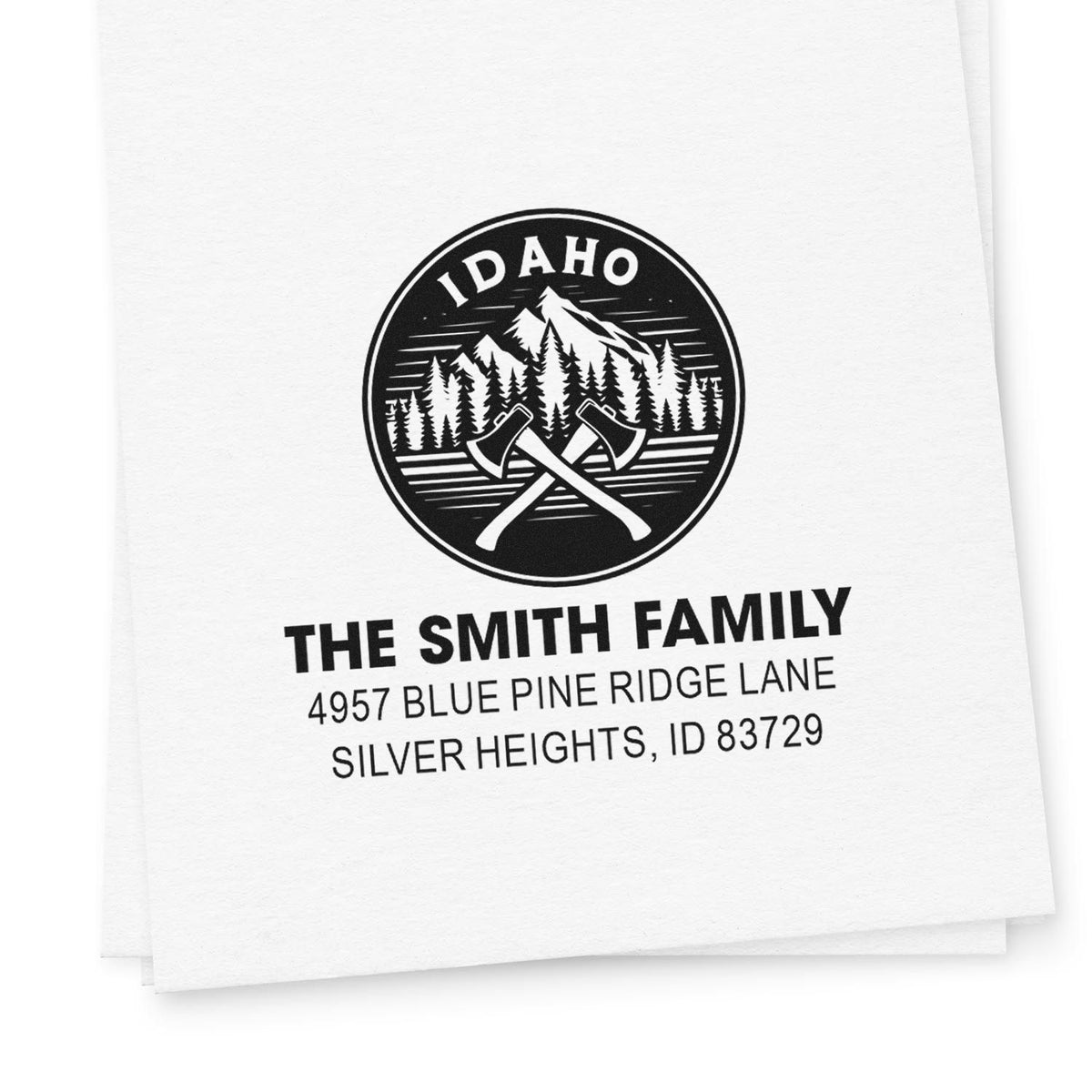 Custom Idaho return address rubber stamp for The Smith Family with mountain and pine tree logo.
