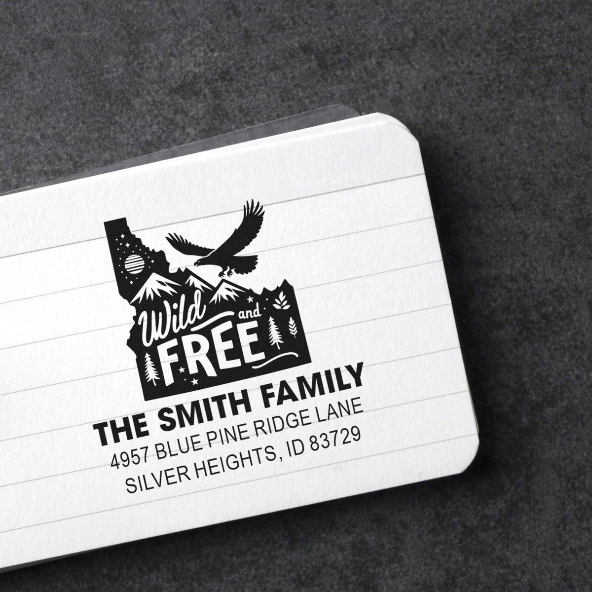 Custom return address rubber stamp with Wild and Free Idaho outdoor design for personalized family mailings.