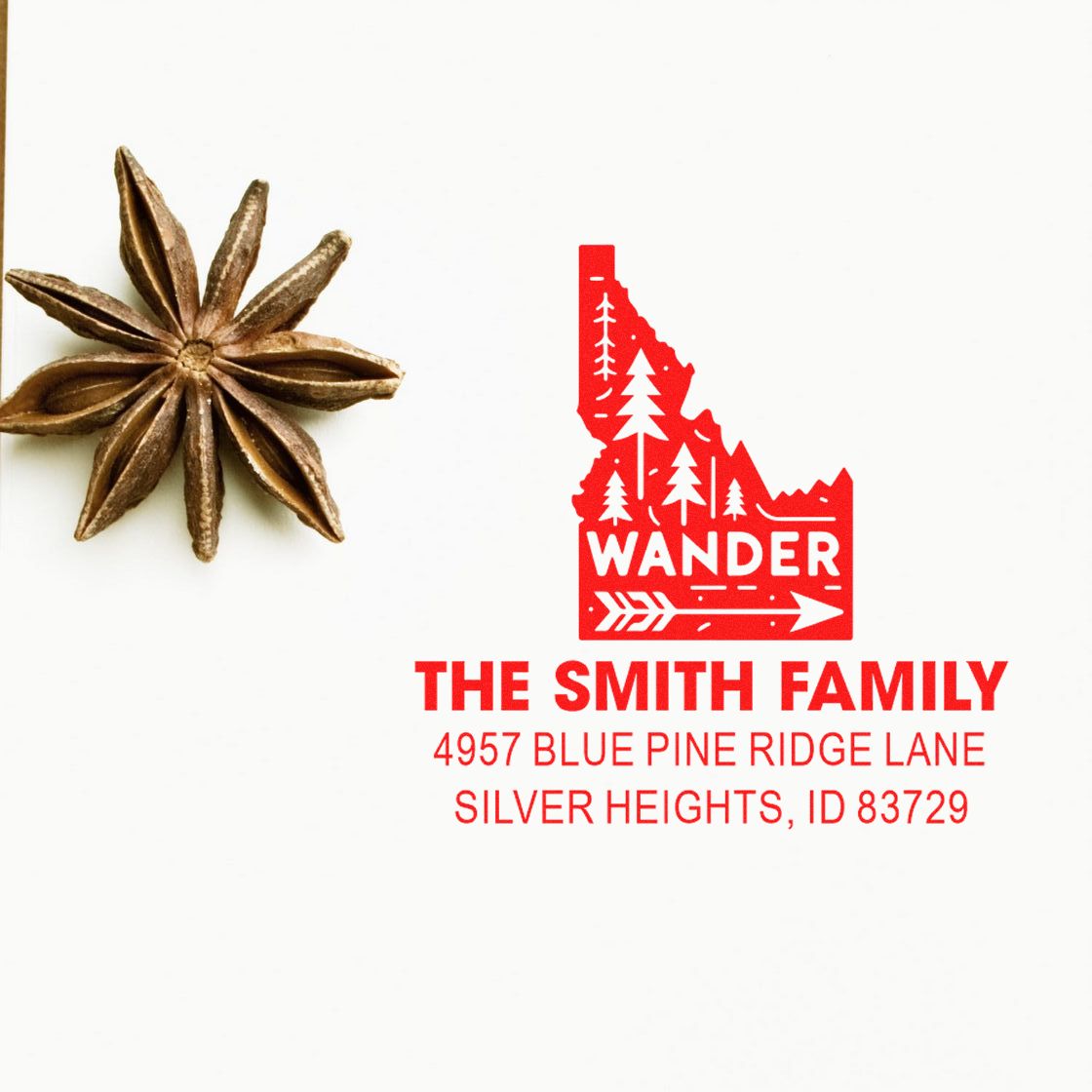 Red custom rubber stamp with Idaho wander design and Smith family return address for personalized mailing.