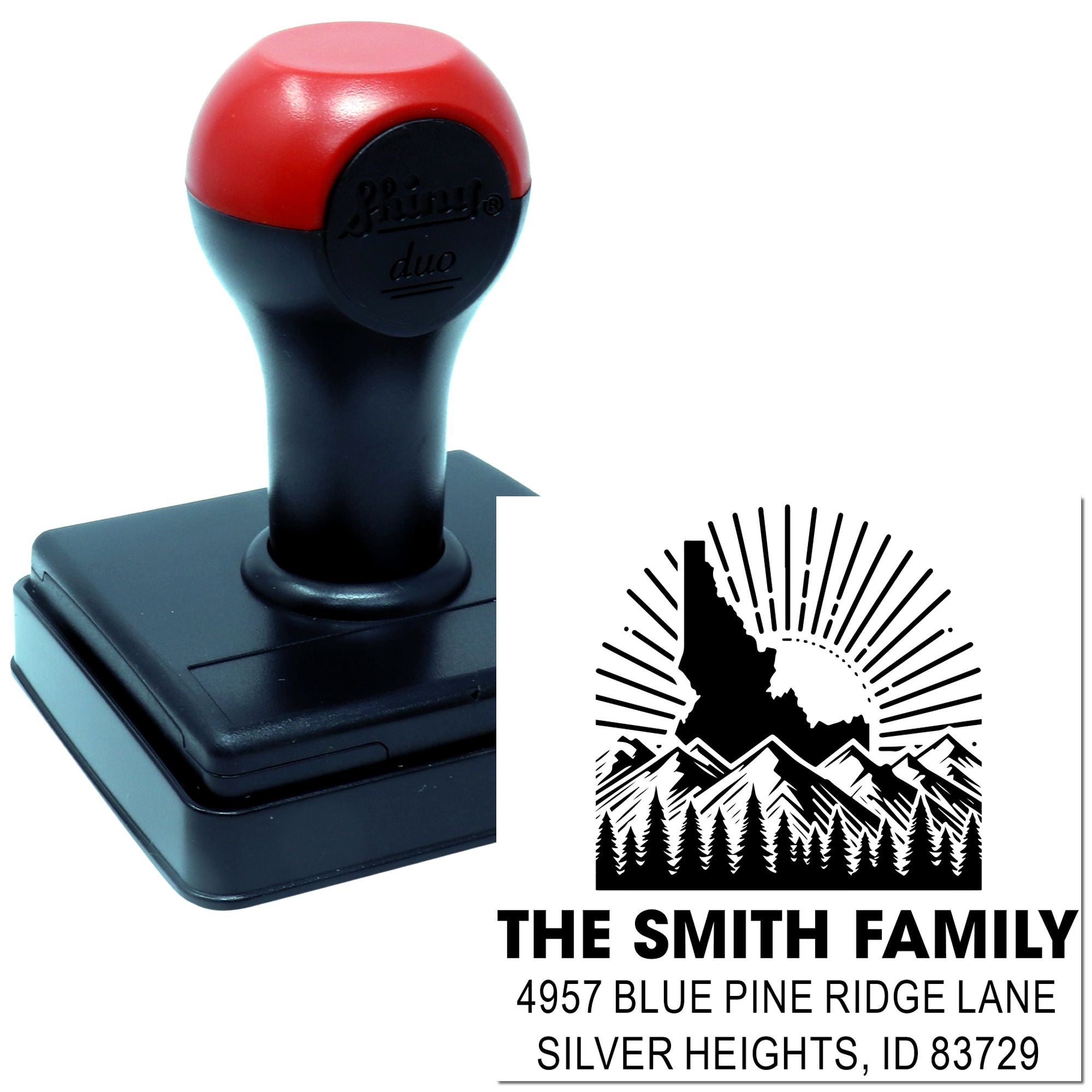 Custom self-inking rubber address stamp with family name, mountain logo, and return address imprint