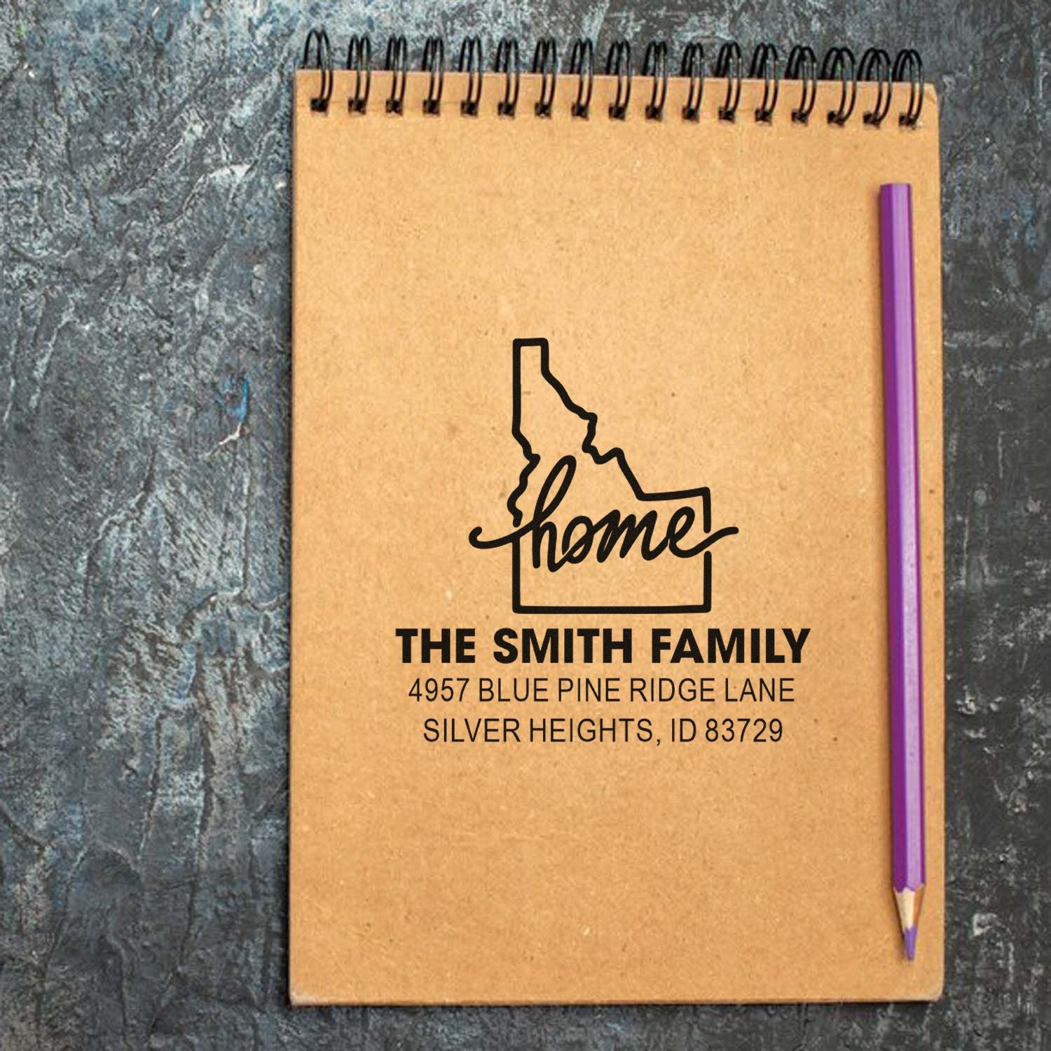 Custom return address rubber stamp with Idaho home outline for The Smith Family
