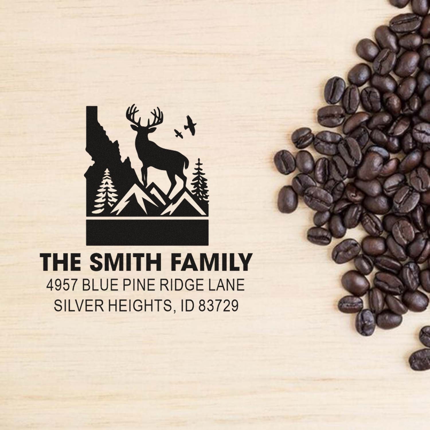 Personalized family address rubber stamp with mountain deer logo for mailing envelopes, cards, and rustic home branding.
