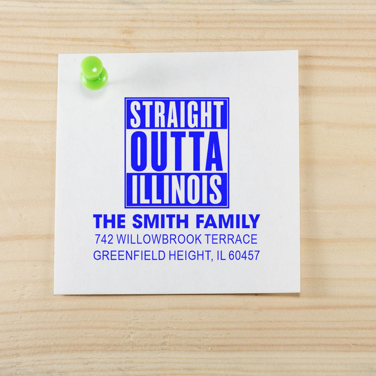 Custom rubber address stamp with Straight Outta Illinois design for The Smith Family on white paper.