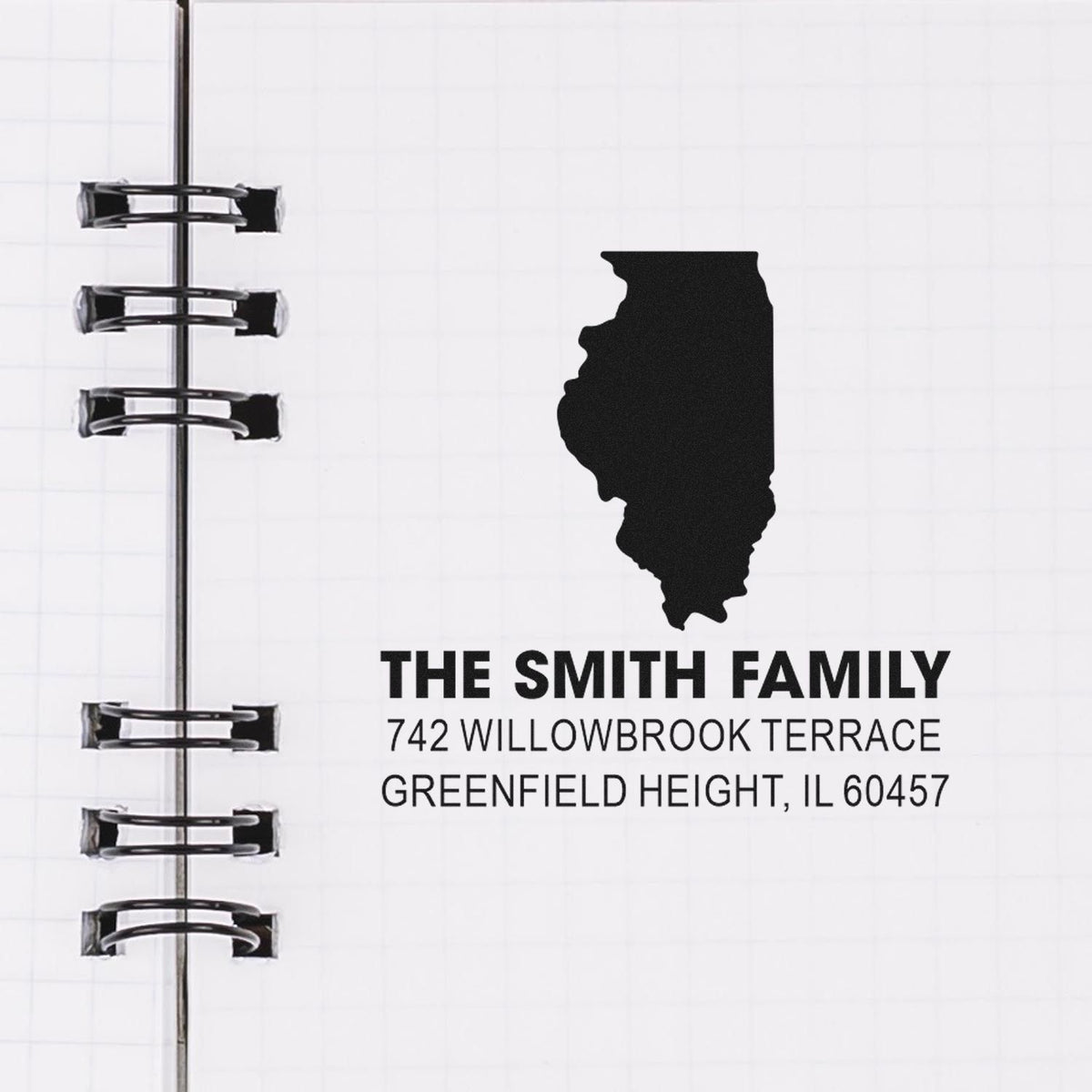 Custom rubber address stamp for The Smith Family with Illinois silhouette and mailing address, Greenfield Height, IL 60457.