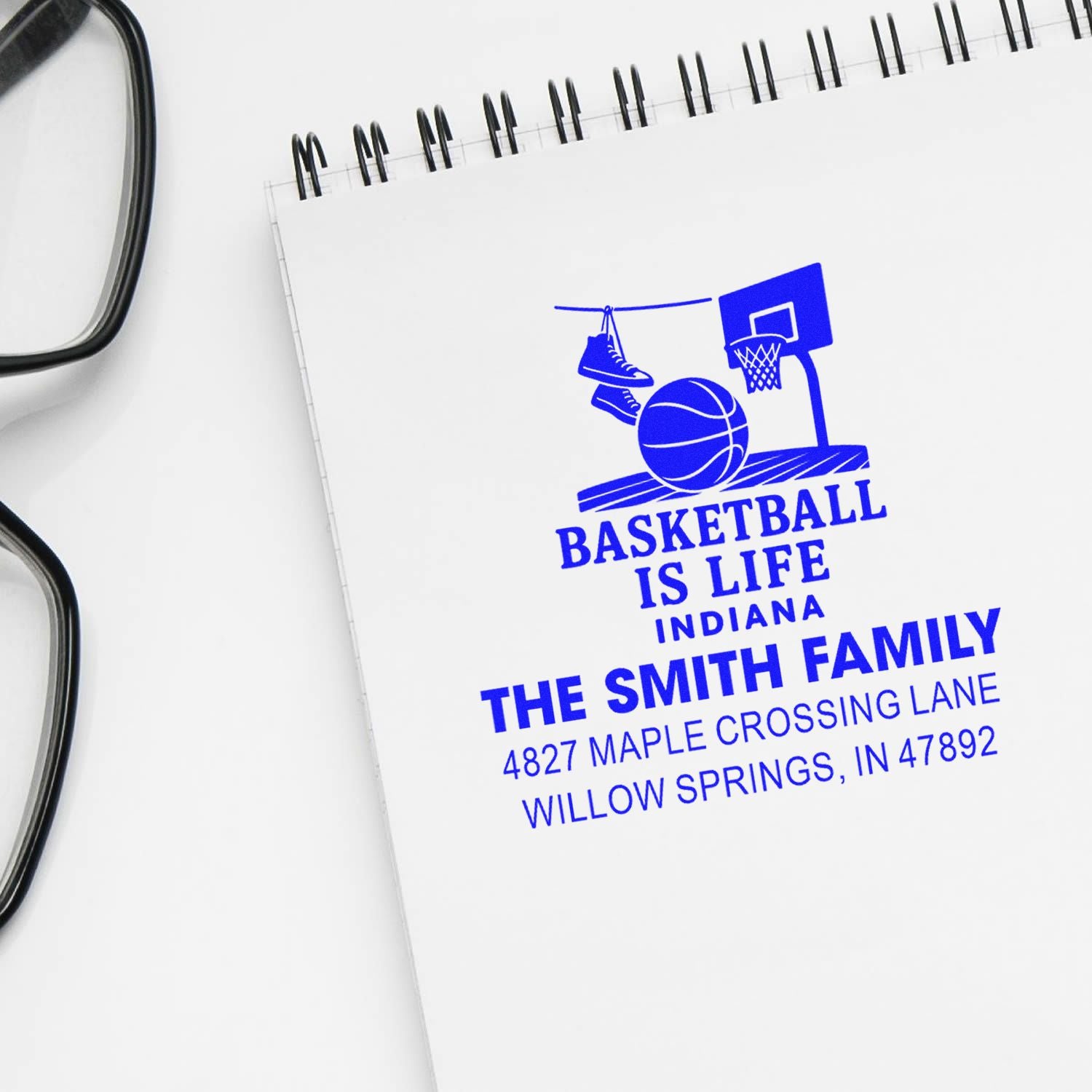 Personalized basketball rubber stamp with family name and address for custom sports-themed return address labeling.
