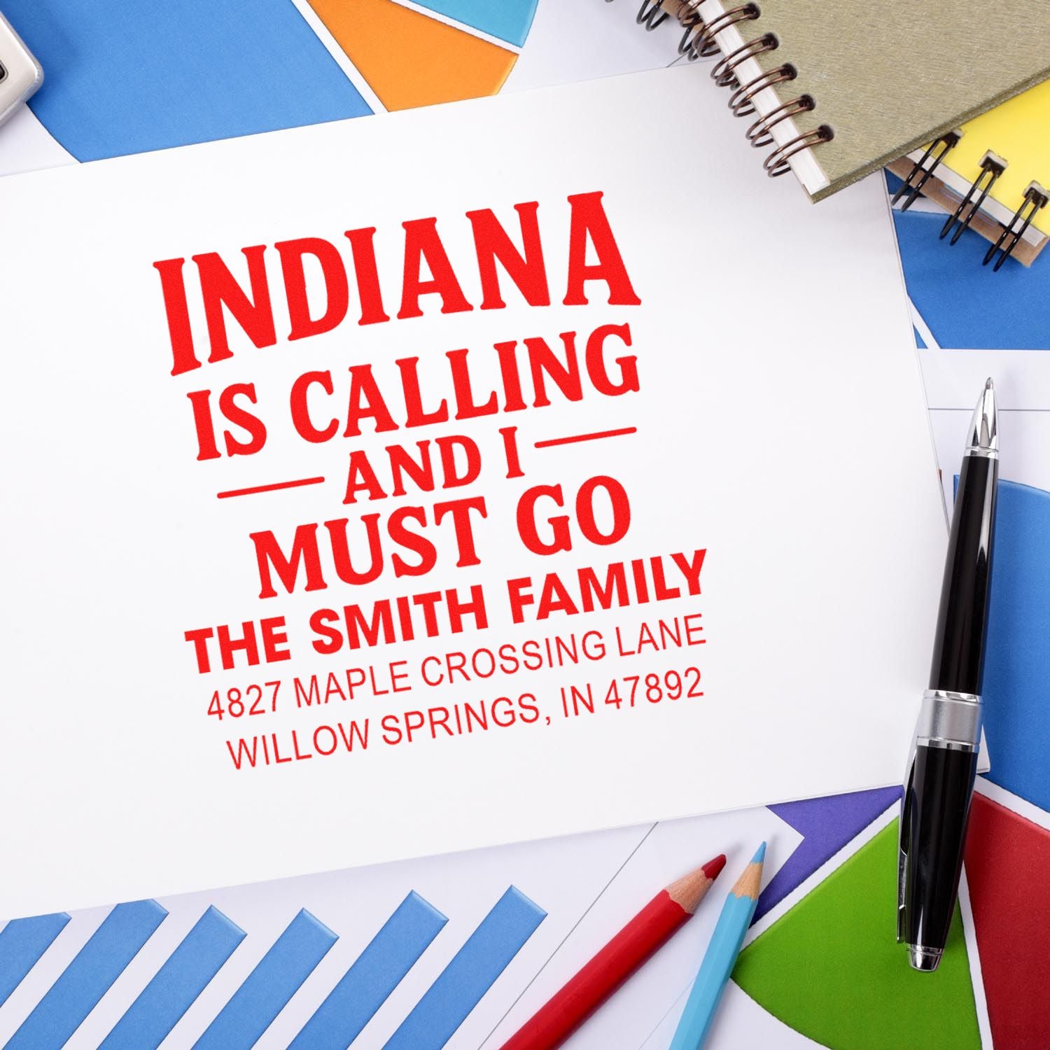 Custom rubber stamp design with Indiana-themed message and personalized return address for stationery and mailings.